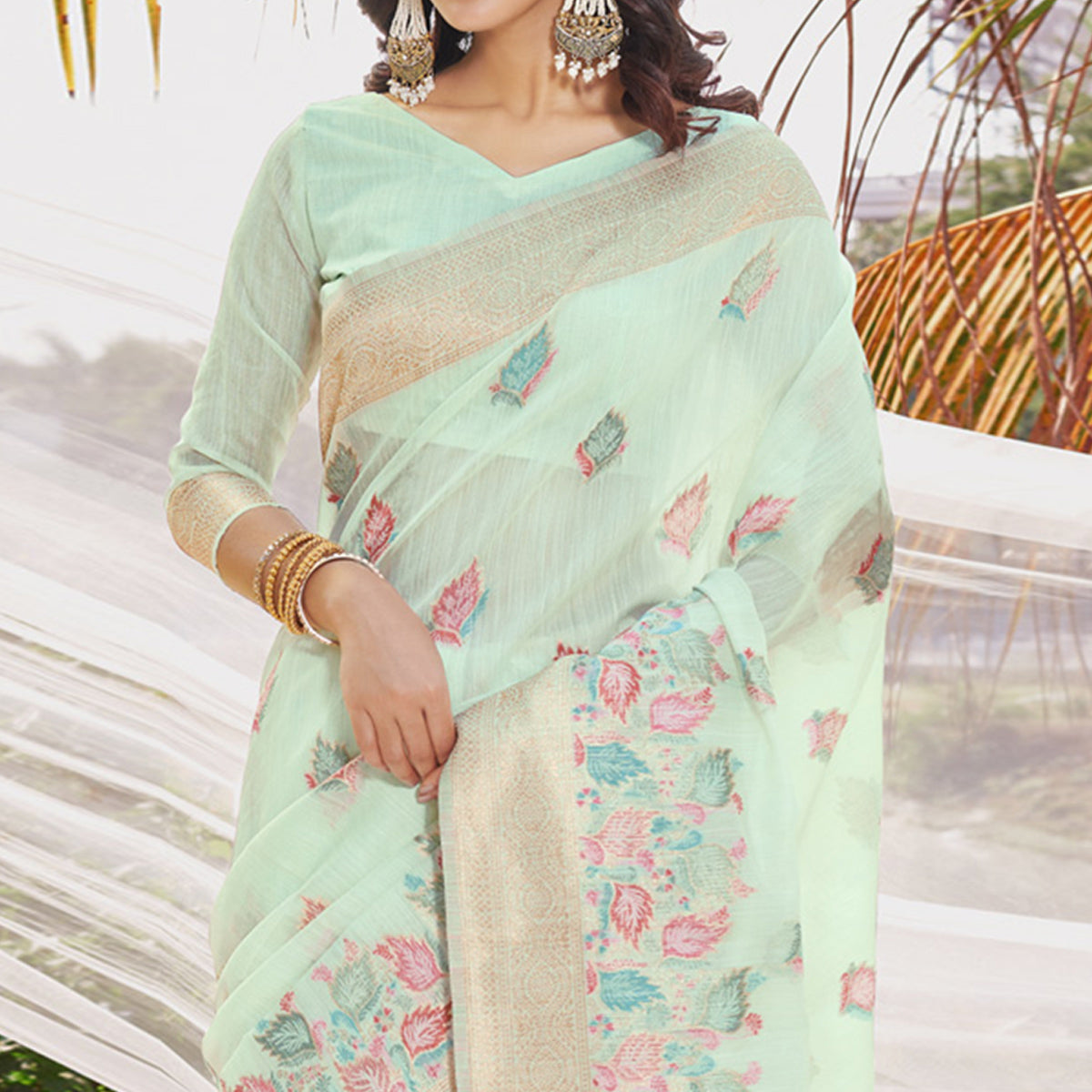 Sea Green Floral Woven Cotton Silk Saree With Tassels