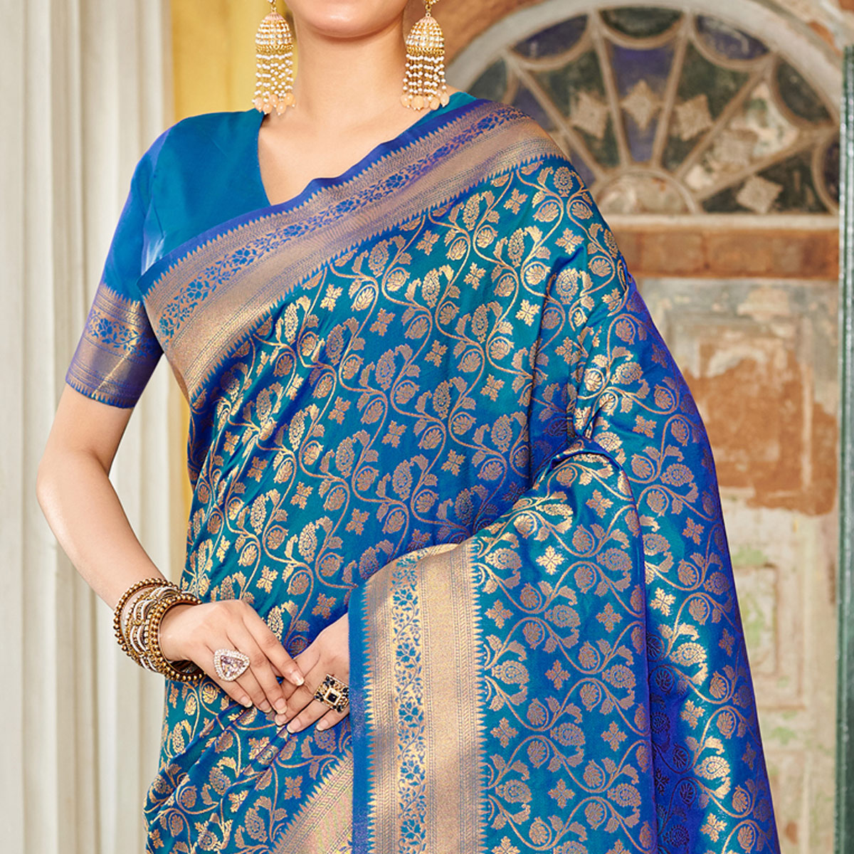 Blue Floral Woven Banarasi Silk Saree With Tassels