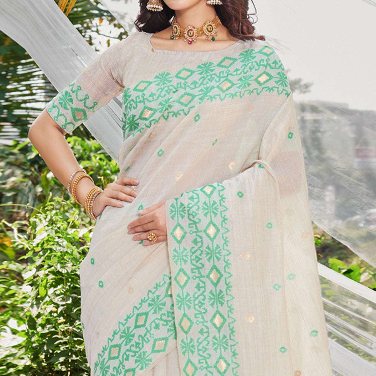Off White & Green Woven Cotton Silk Saree With Tassels