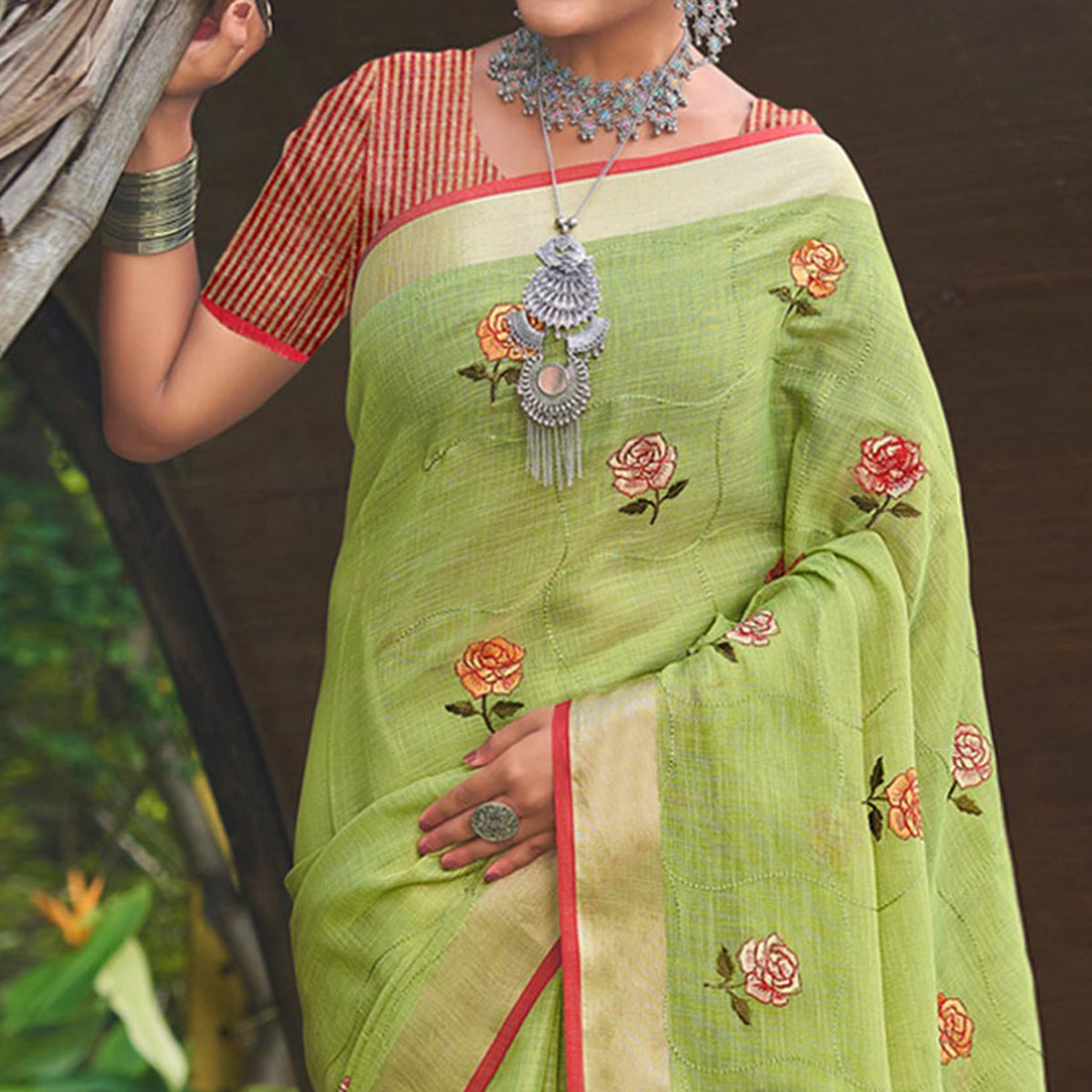 Green Floral Embroidered Linen Saree With Tassels