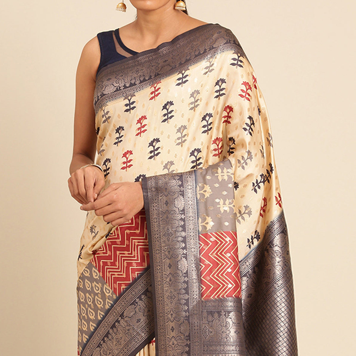 Cream Woven Banarasi Silk Saree With Tassels