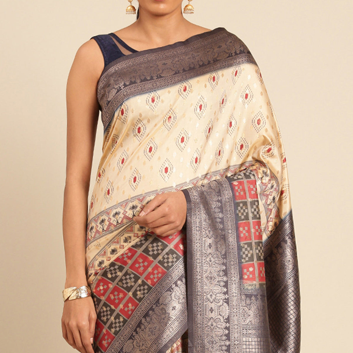 Cream Woven Banarasi Silk Saree With Tassels