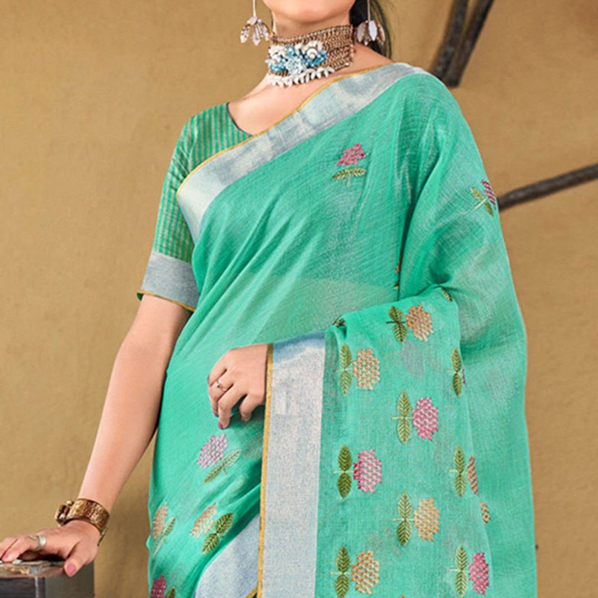 Sea Green Floral Embroidered Linen Saree With Tassels