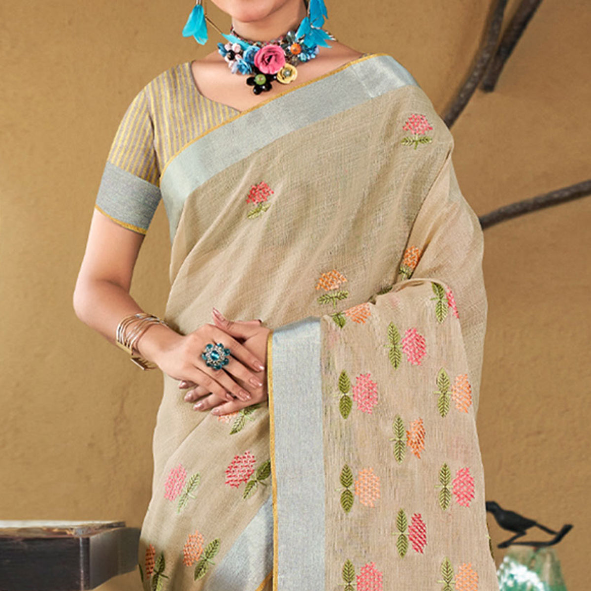 Beige Floral Embroidered Linen Saree With Tassels
