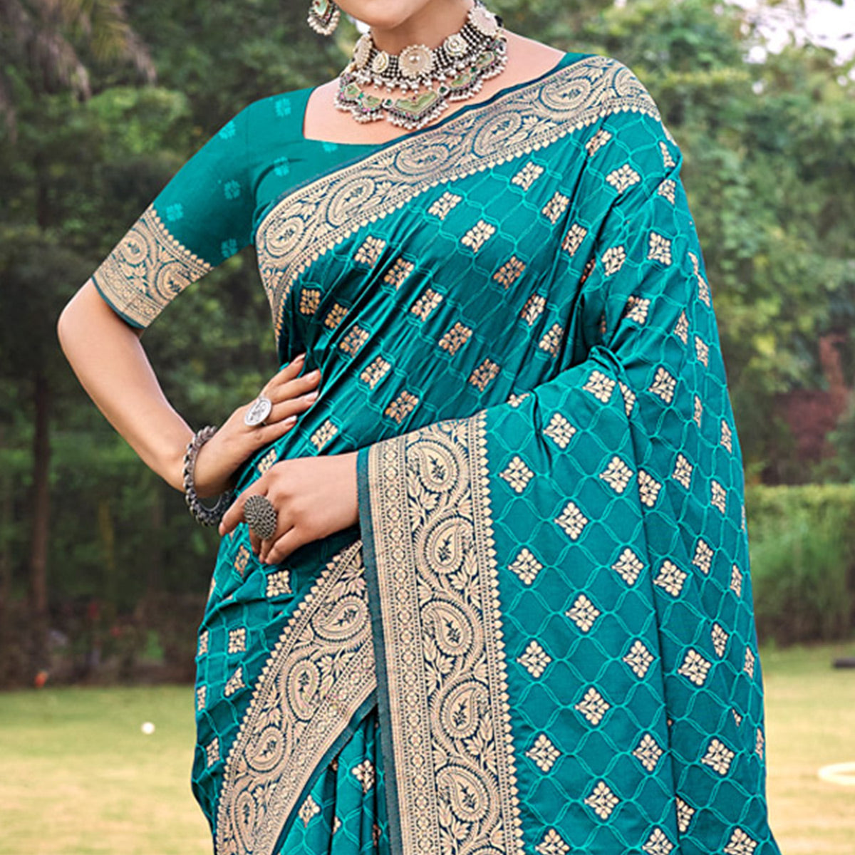 Rama Blue Floral Woven Kanjivaram Silk Saree With Tassels