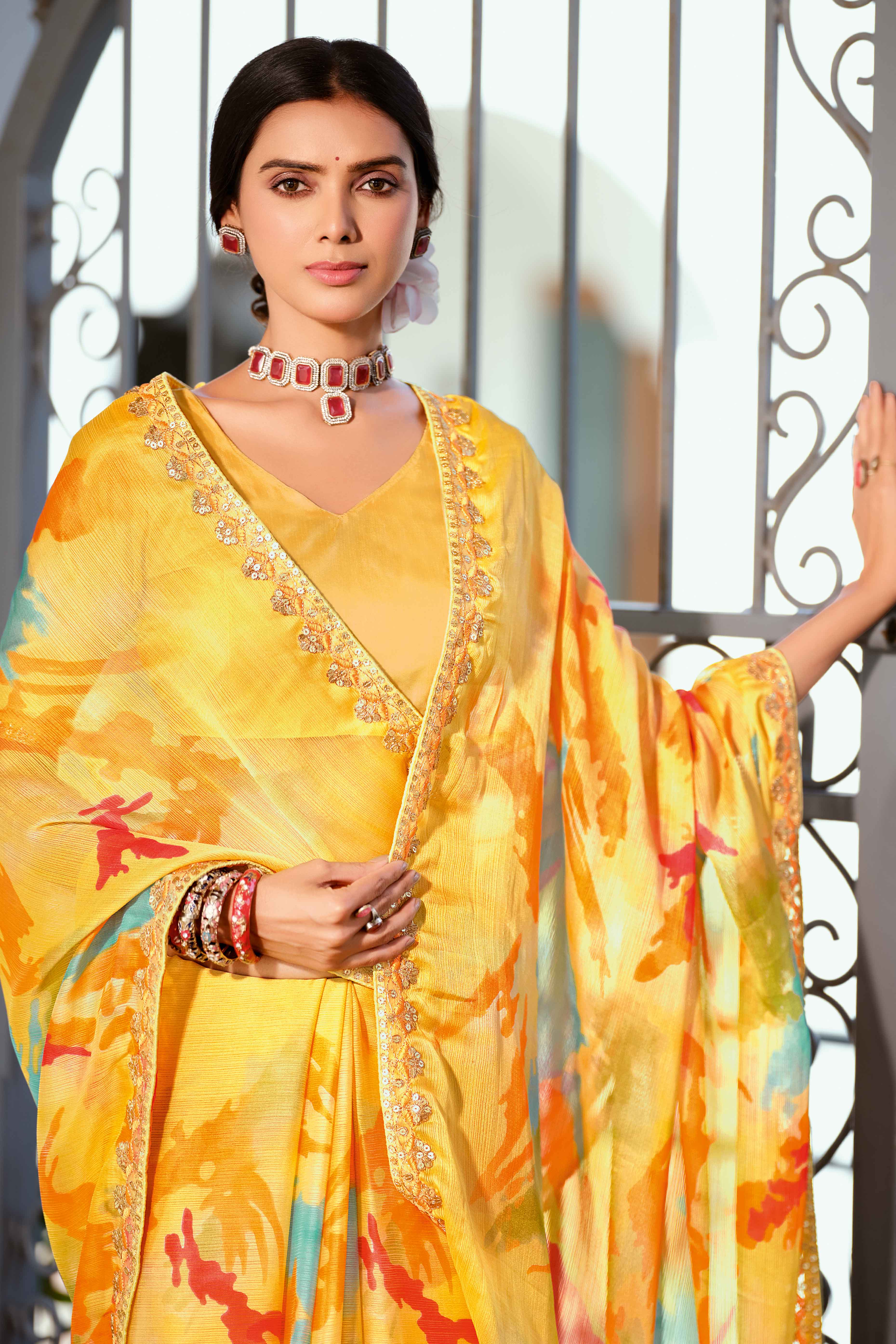 Festive Yellow Georgette Saree with Dazzling Sequin Work Border