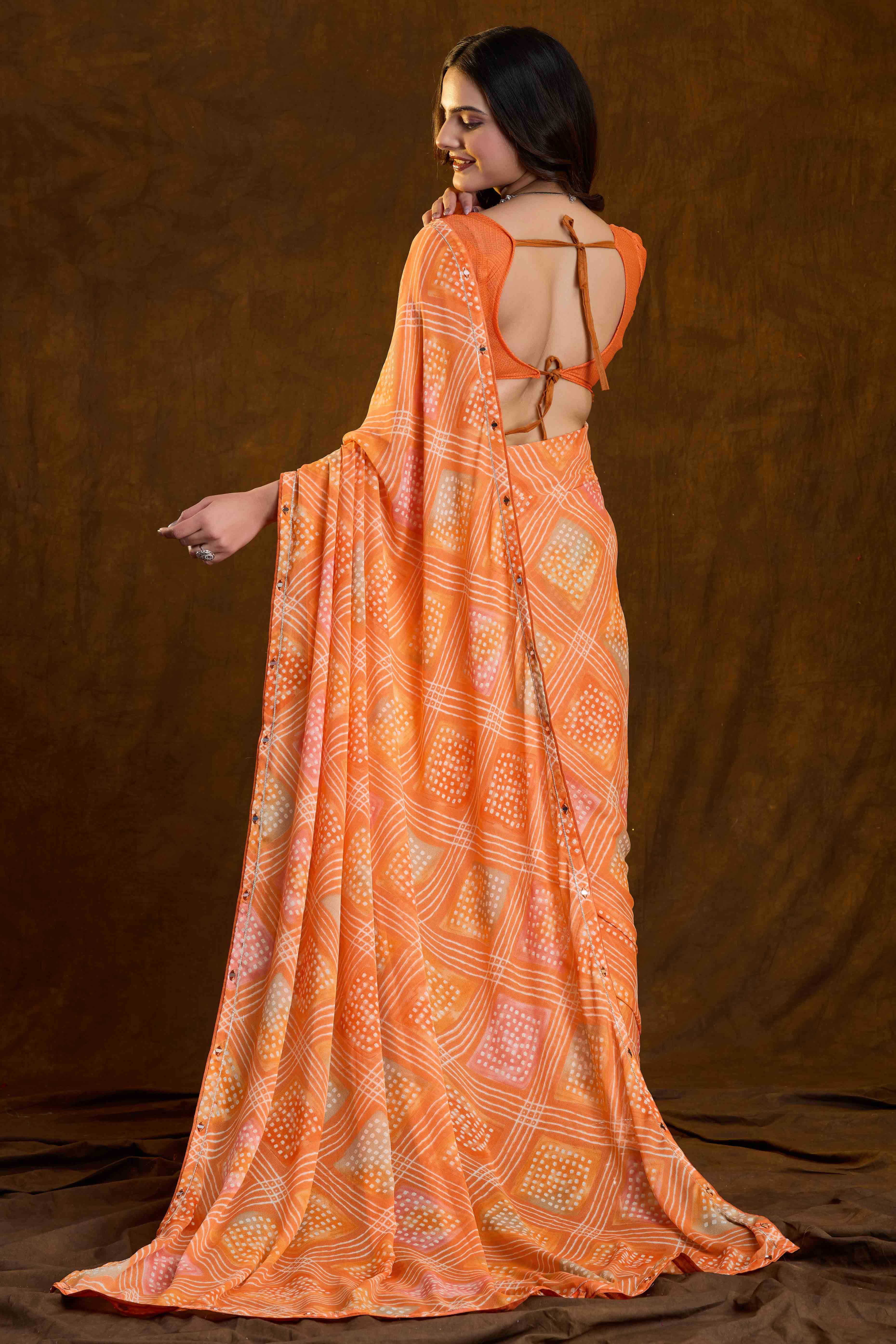 Orange Bandhani Printed Chiffon Saree With Sparkling Mirror Work Border