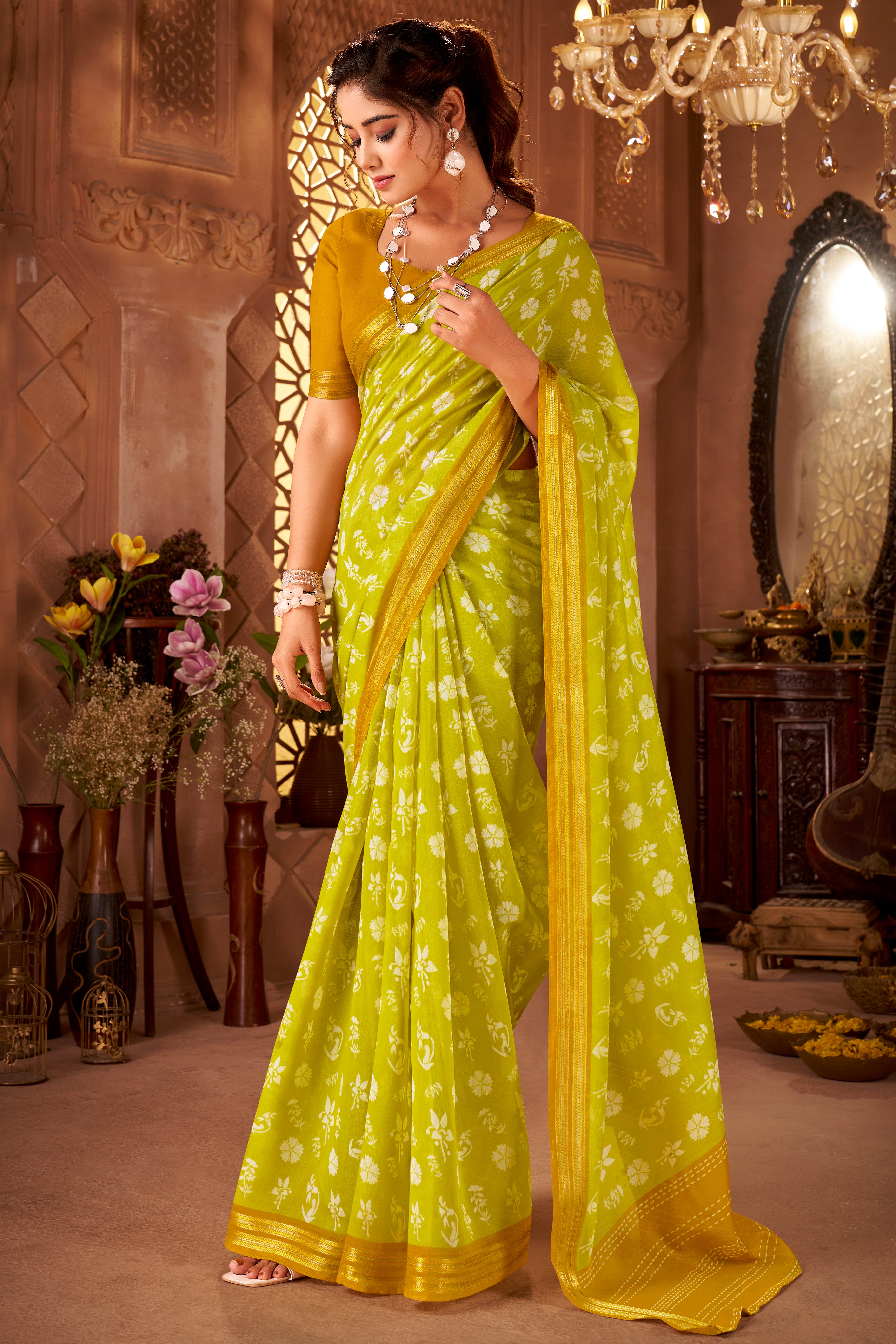 Sophisticated Lemon Green Mulmul Cotton Saree Featuring Delicate Floral Prints & Weaving Border