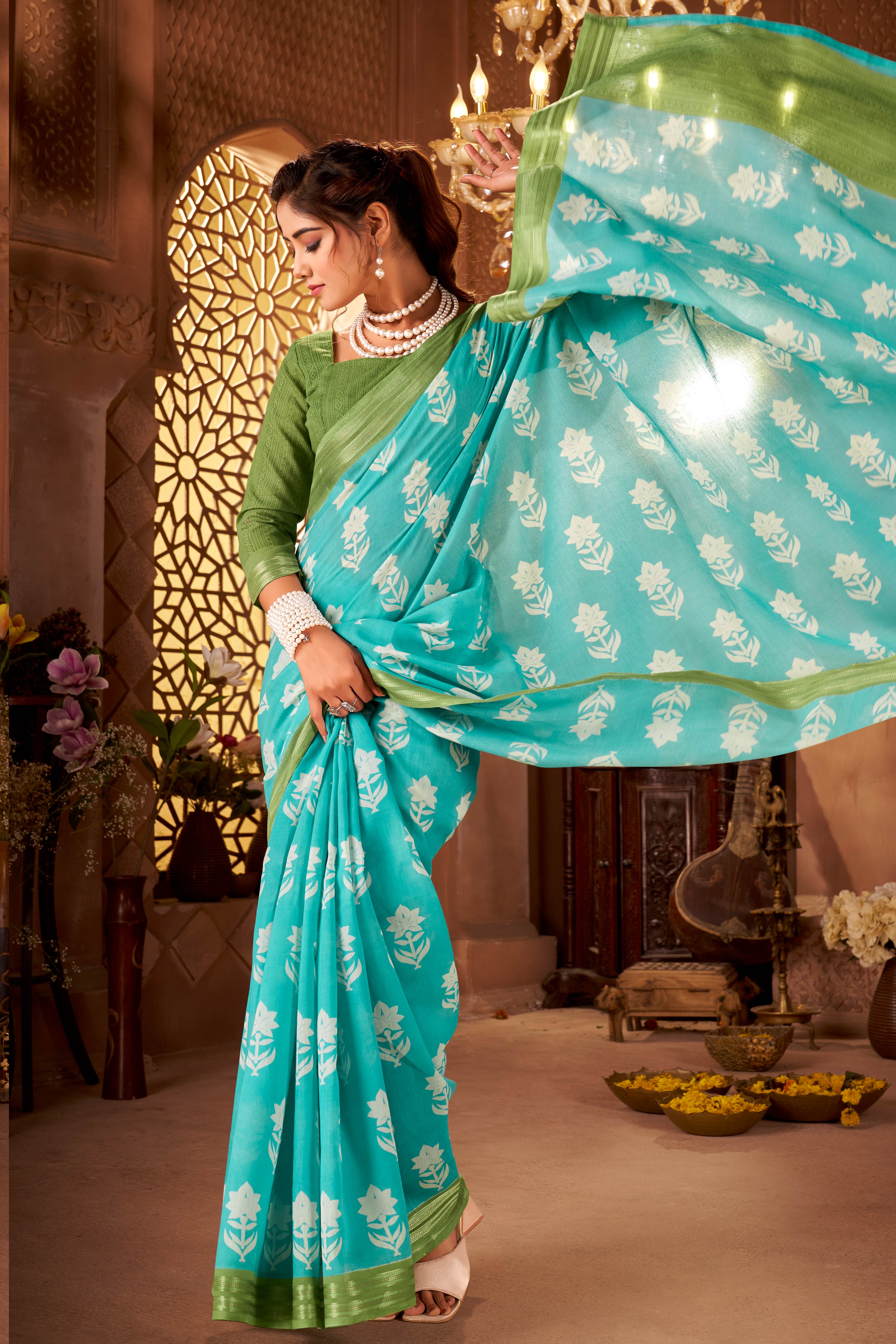 Sophisticated Blue Mulmul Cotton Saree Featuring Delicate Floral Prints & Weaving Border