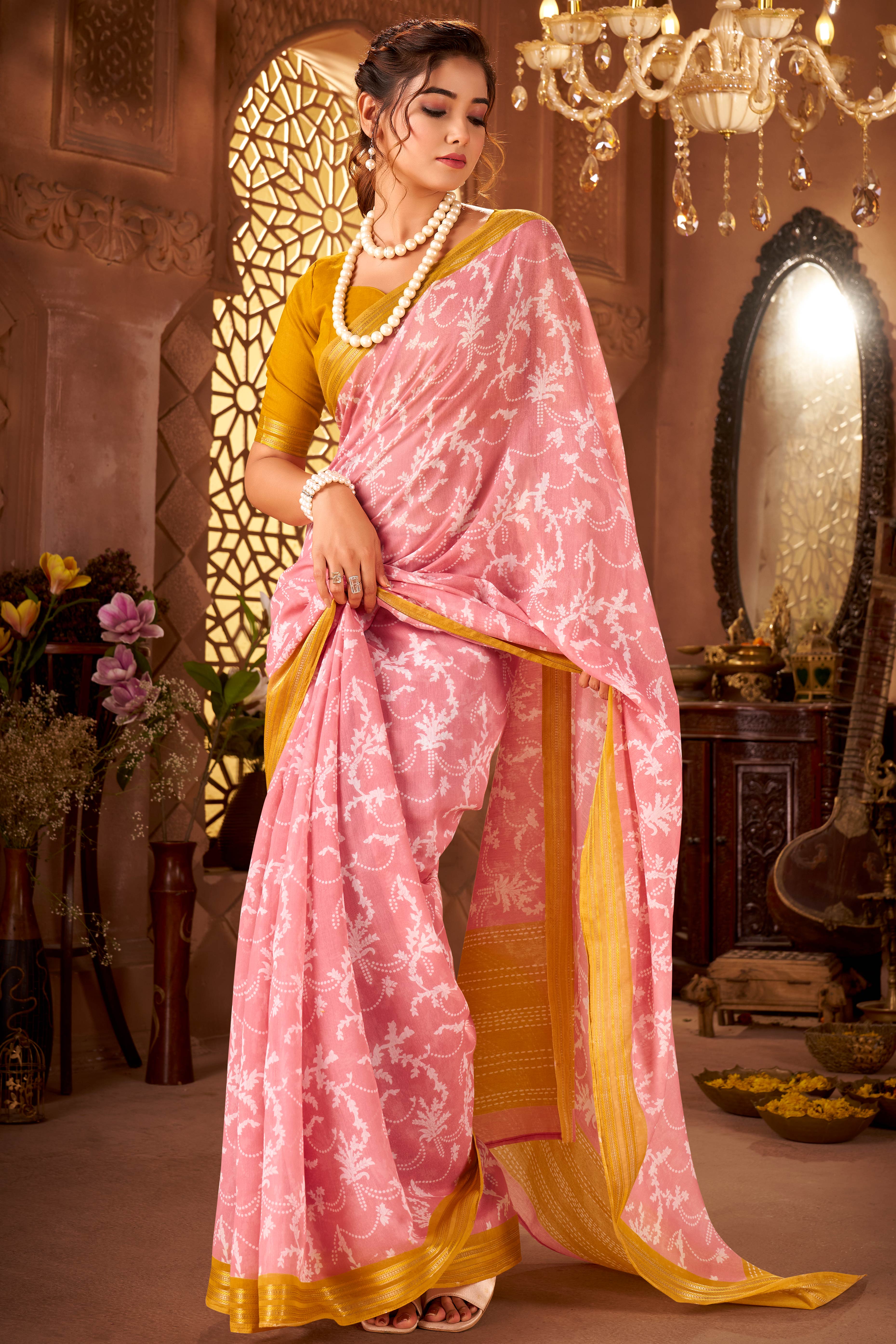 Sophisticated Baby Pink Mulmul Cotton Saree Featuring Delicate Floral Prints & Weaving Border
