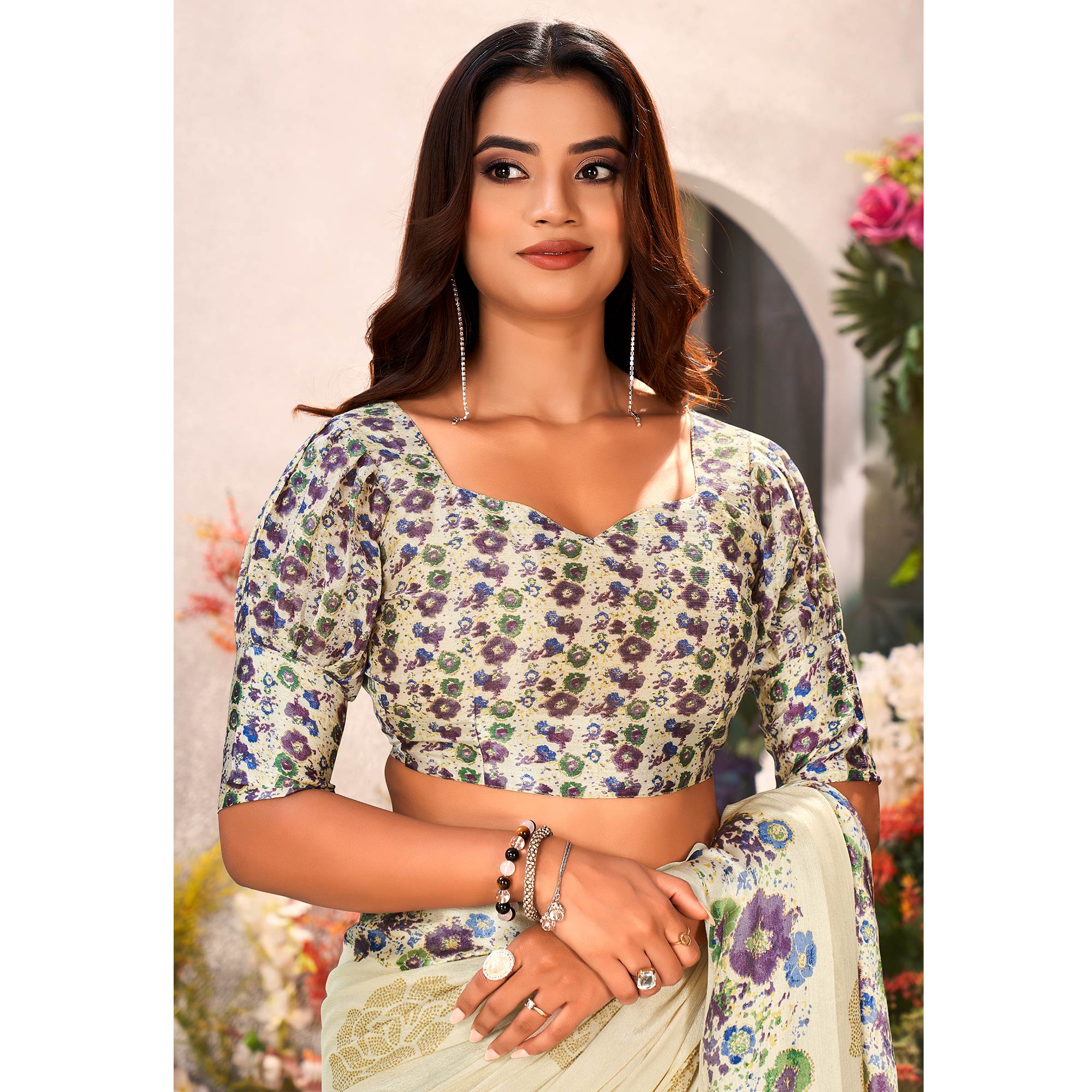 Cream Floral Foil Printed Chiffon Saree With Tassels