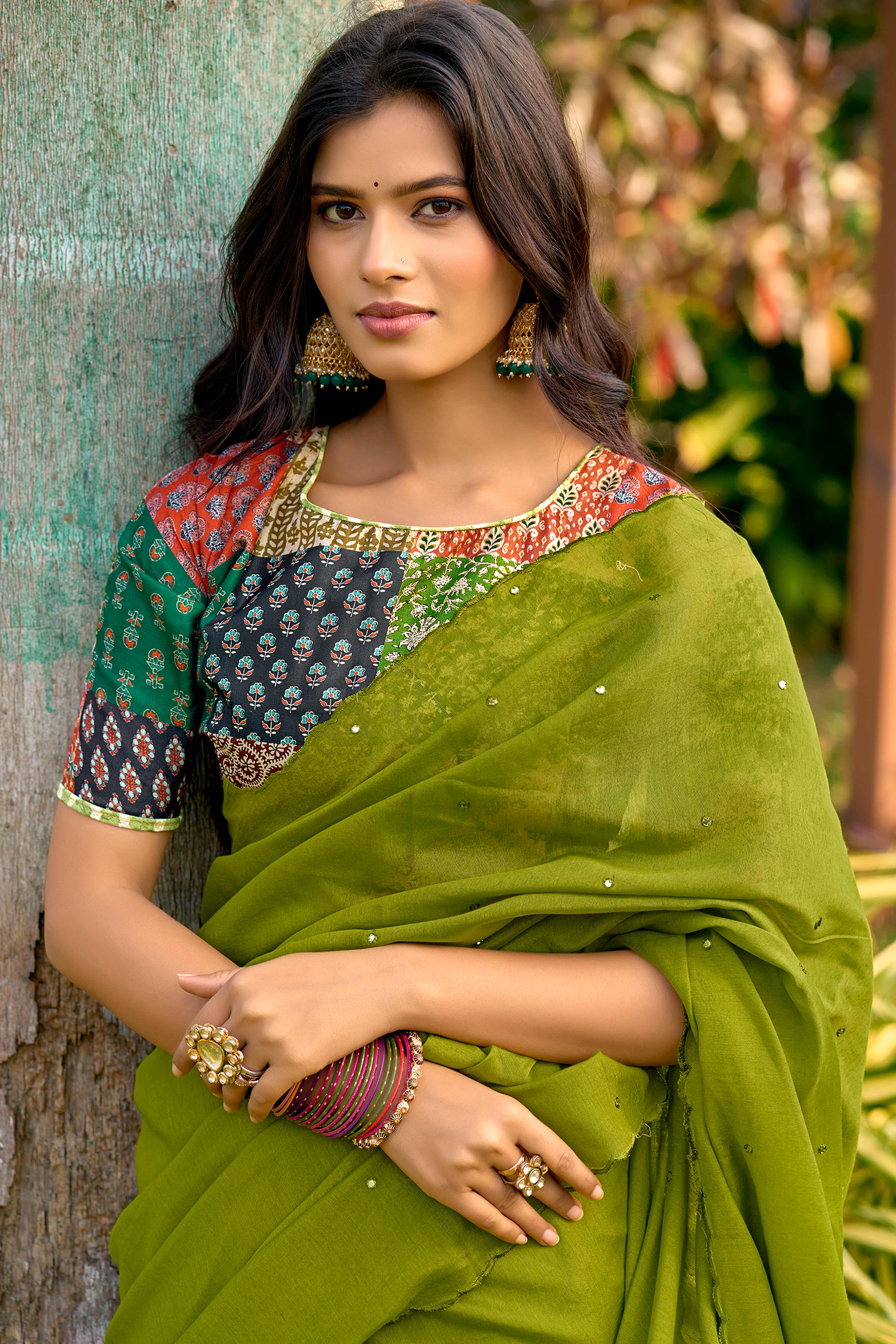Timeless Green Cotton Blend Drape Highlighted With Shimmering Mirror Embroidery Work