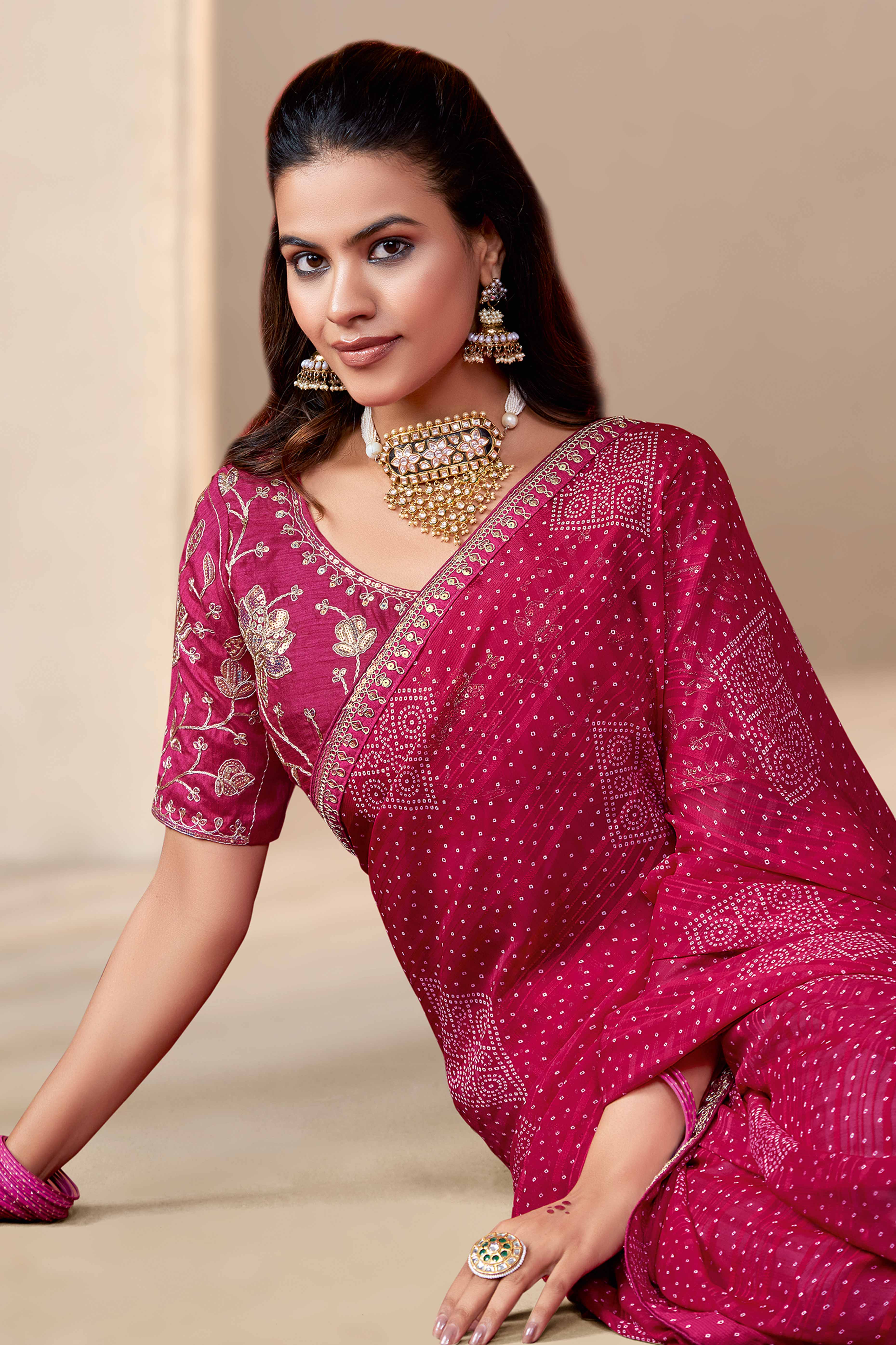 Rani Pink Bandhani Printed Georgette Saree Enhanced With Sequins & Cording Embroidered Lace Border