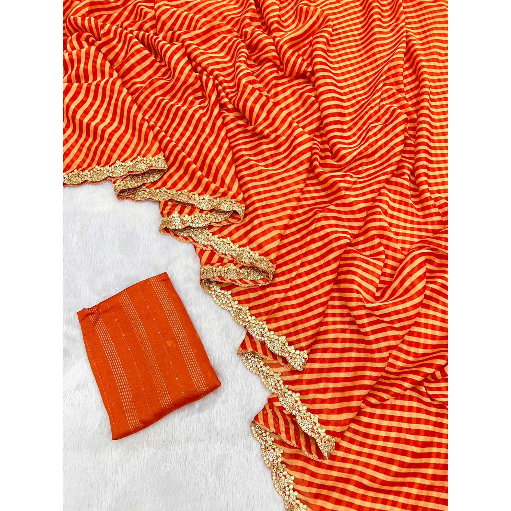 Orange Striped Printed Chiffon Saree With Sequins Embroidered Border