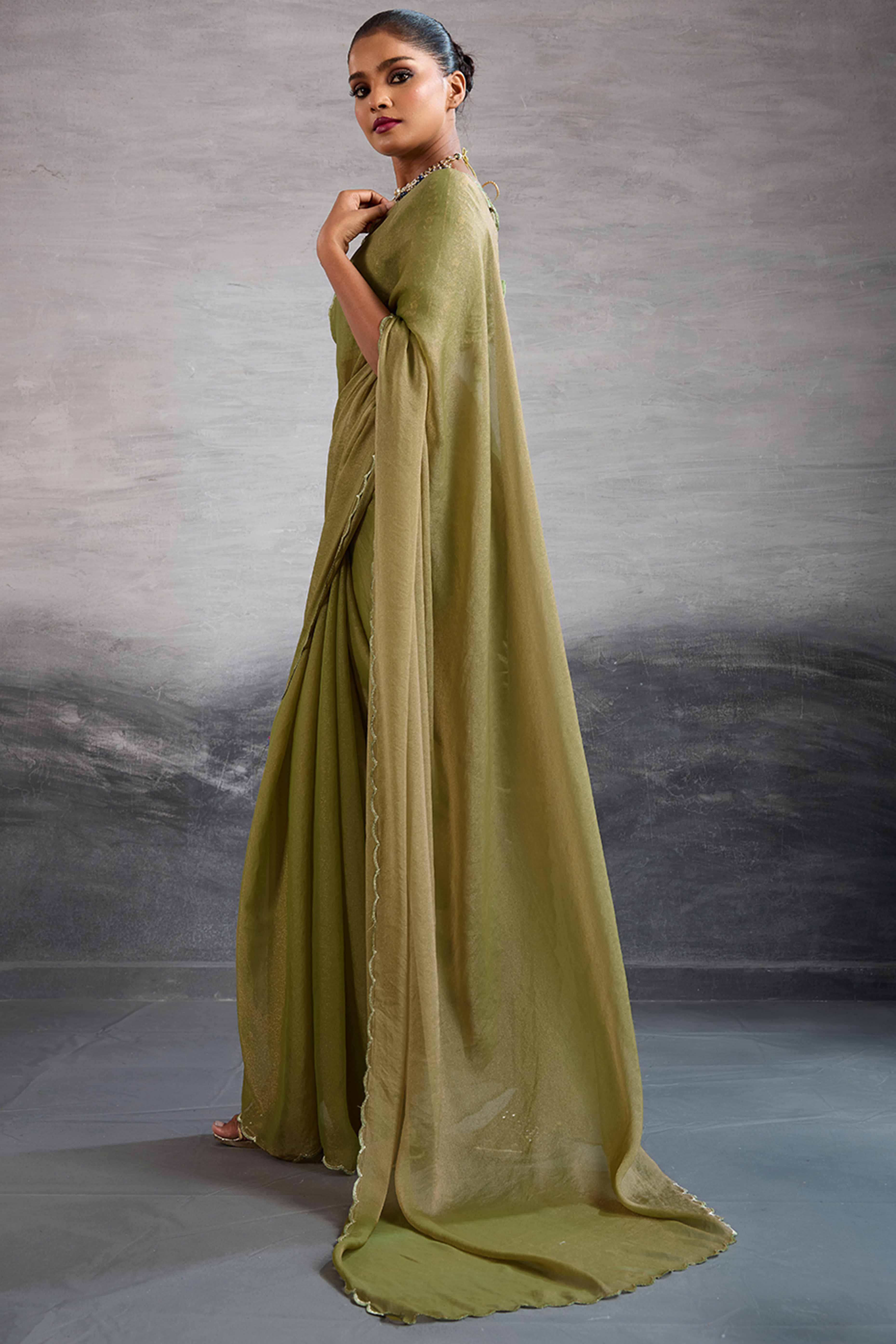 Light Olive Green Solid Organza Jimmy Choo Saree Accentuated With Elegant Cutwork Border Detailing
