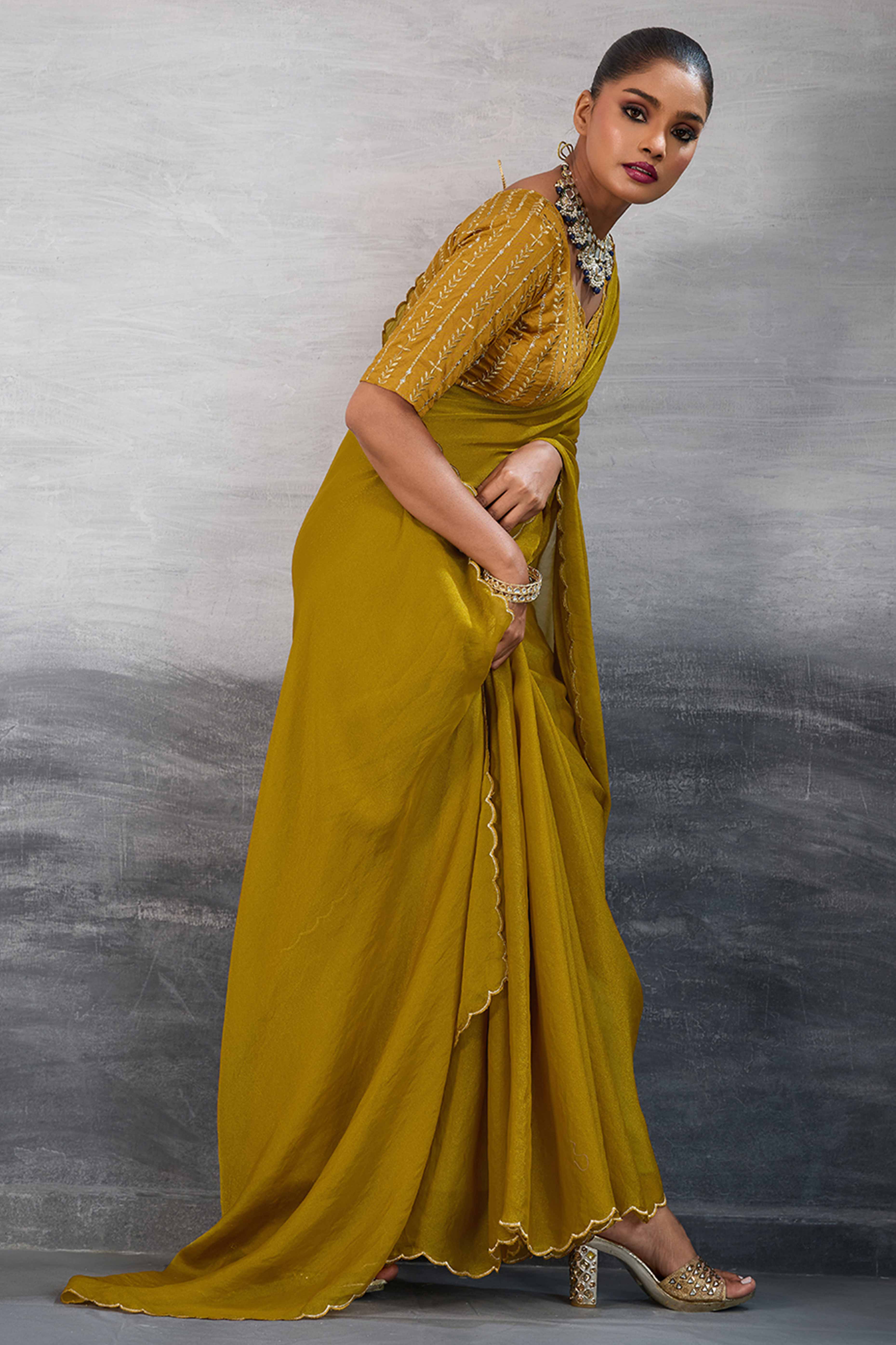 Mustard Solid Organza Jimmy Choo Saree Accentuated With Elegant Cutwork Border Detailing