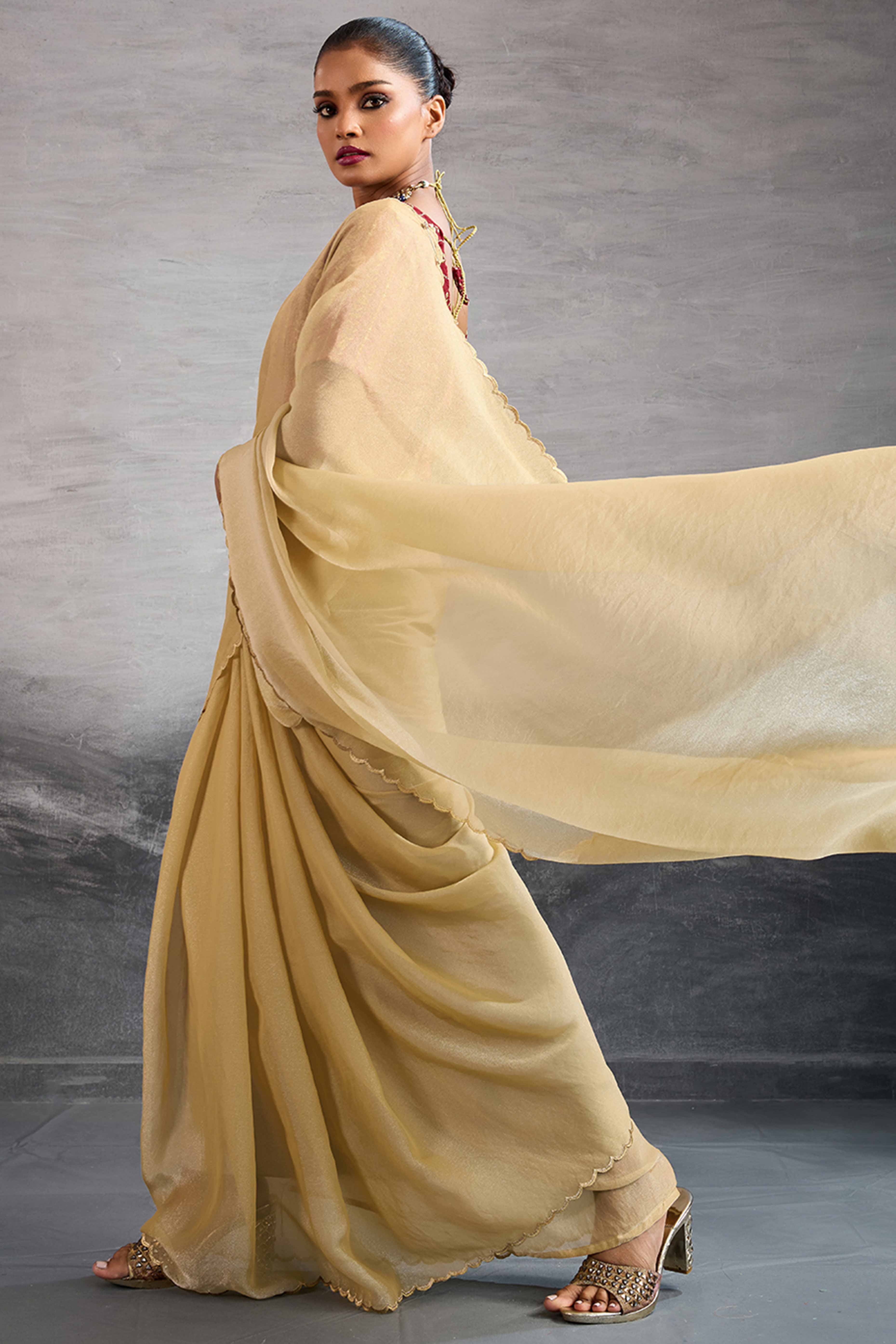 Cream Solid Organza Jimmy Choo Saree Accentuated With Elegant Cutwork Border Detailing