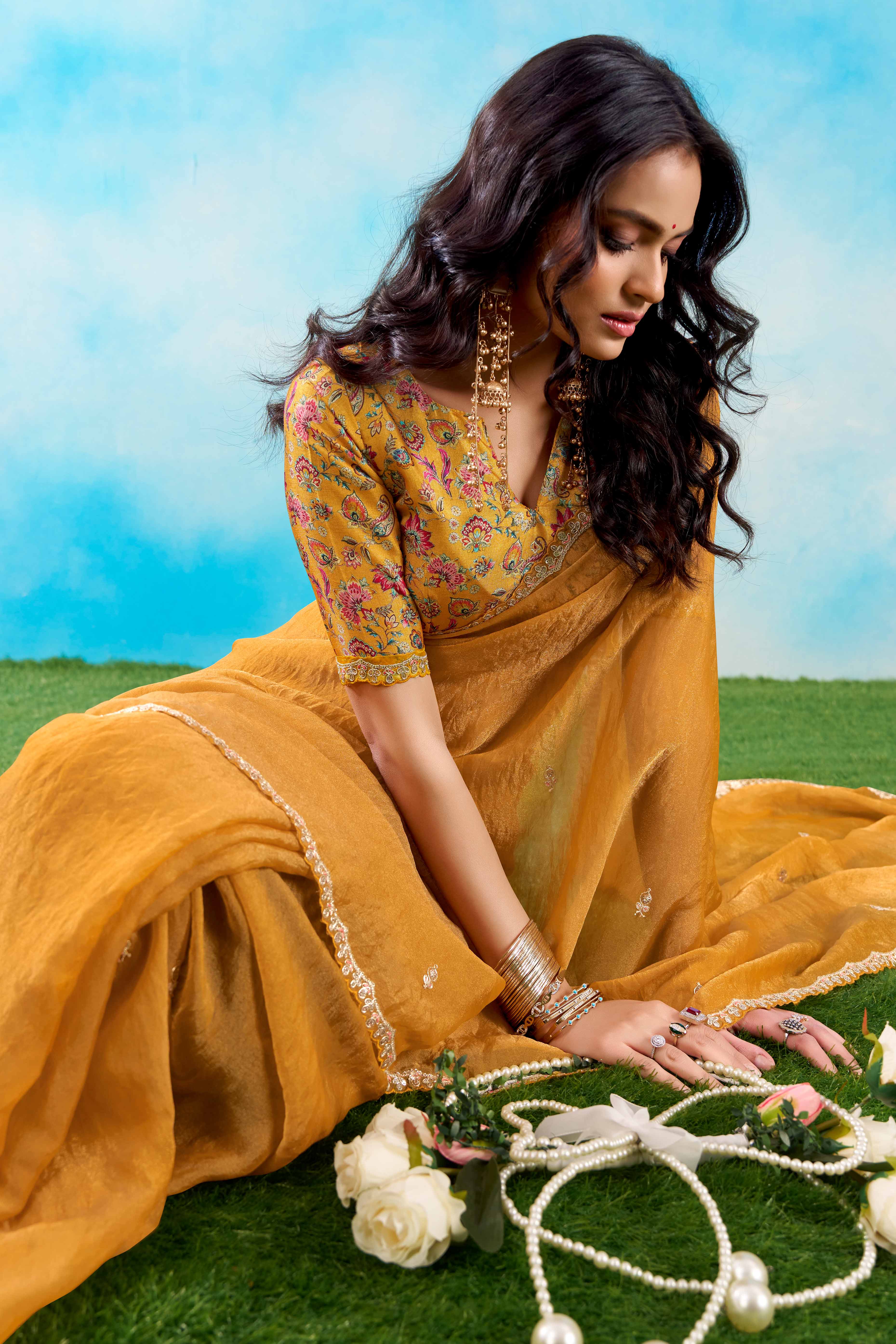 Luxurious Mustard Chiffon Saree Showcasing Floral Sequins Embroidery In A Two Tone Finish