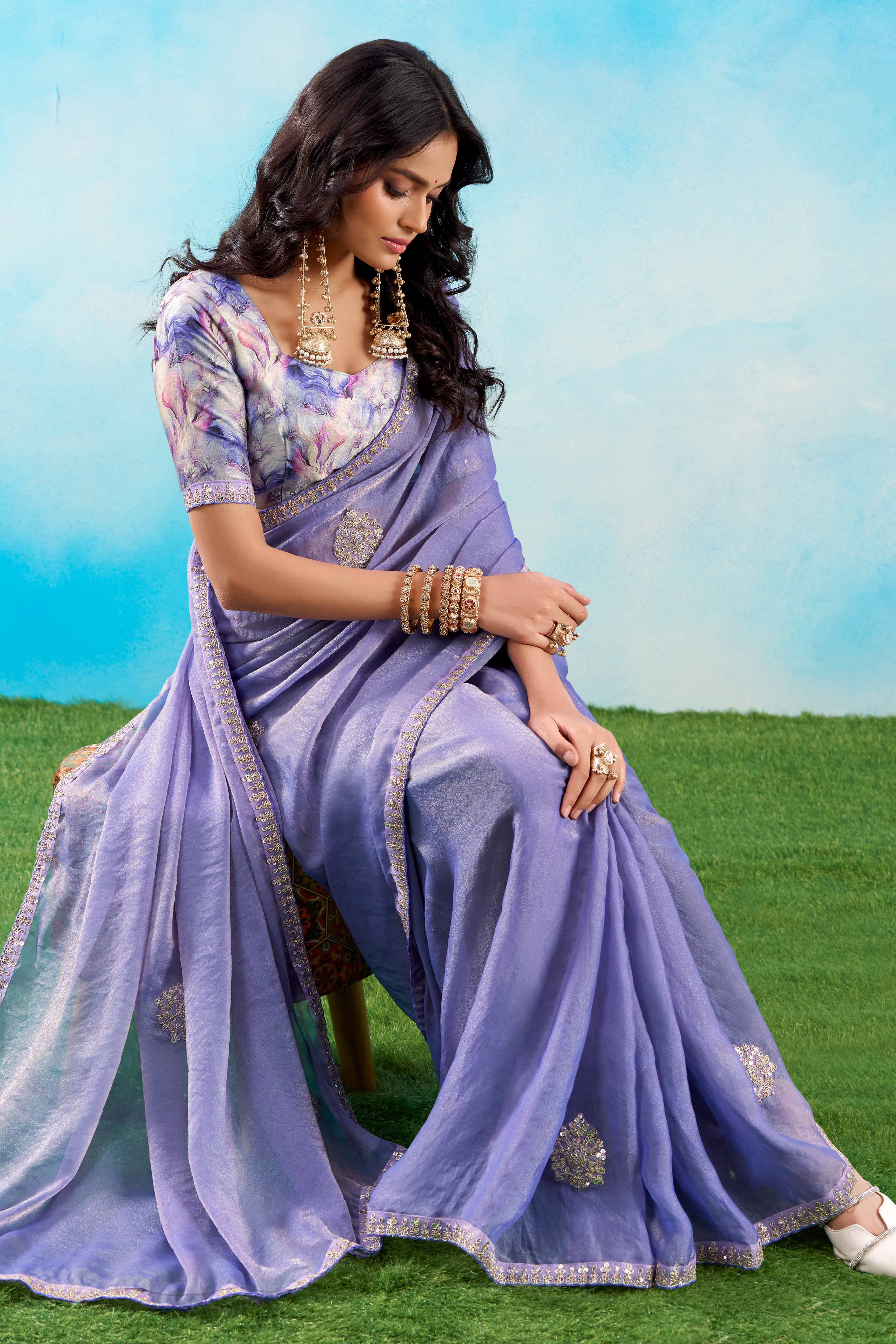 Luxurious Lavender Chiffon Saree Showcasing Floral Sequins Embroidery In A Two Tone Finish