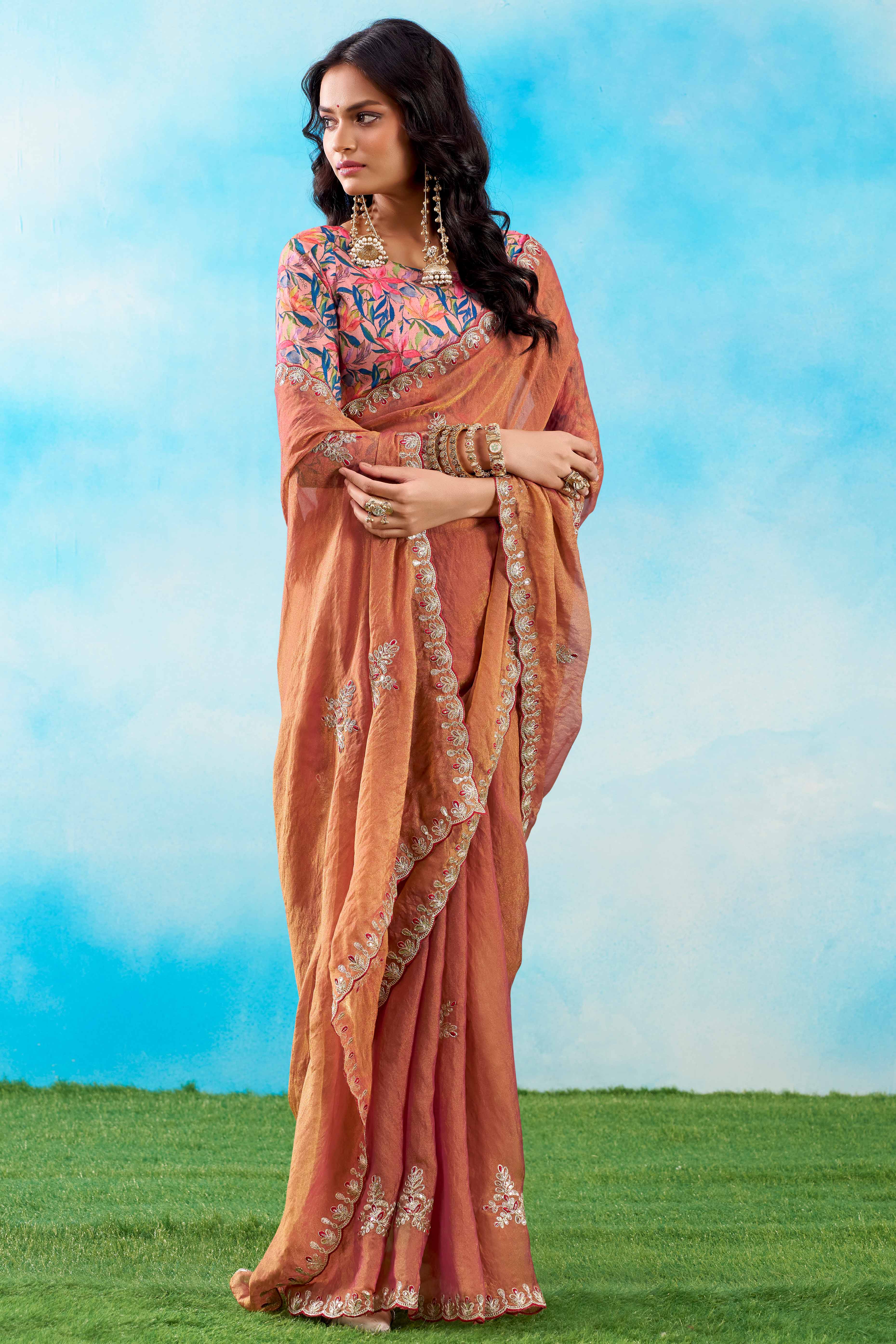 Luxurious Peach Chiffon Saree Showcasing Floral Sequins Embroidery In A Two Tone Finish