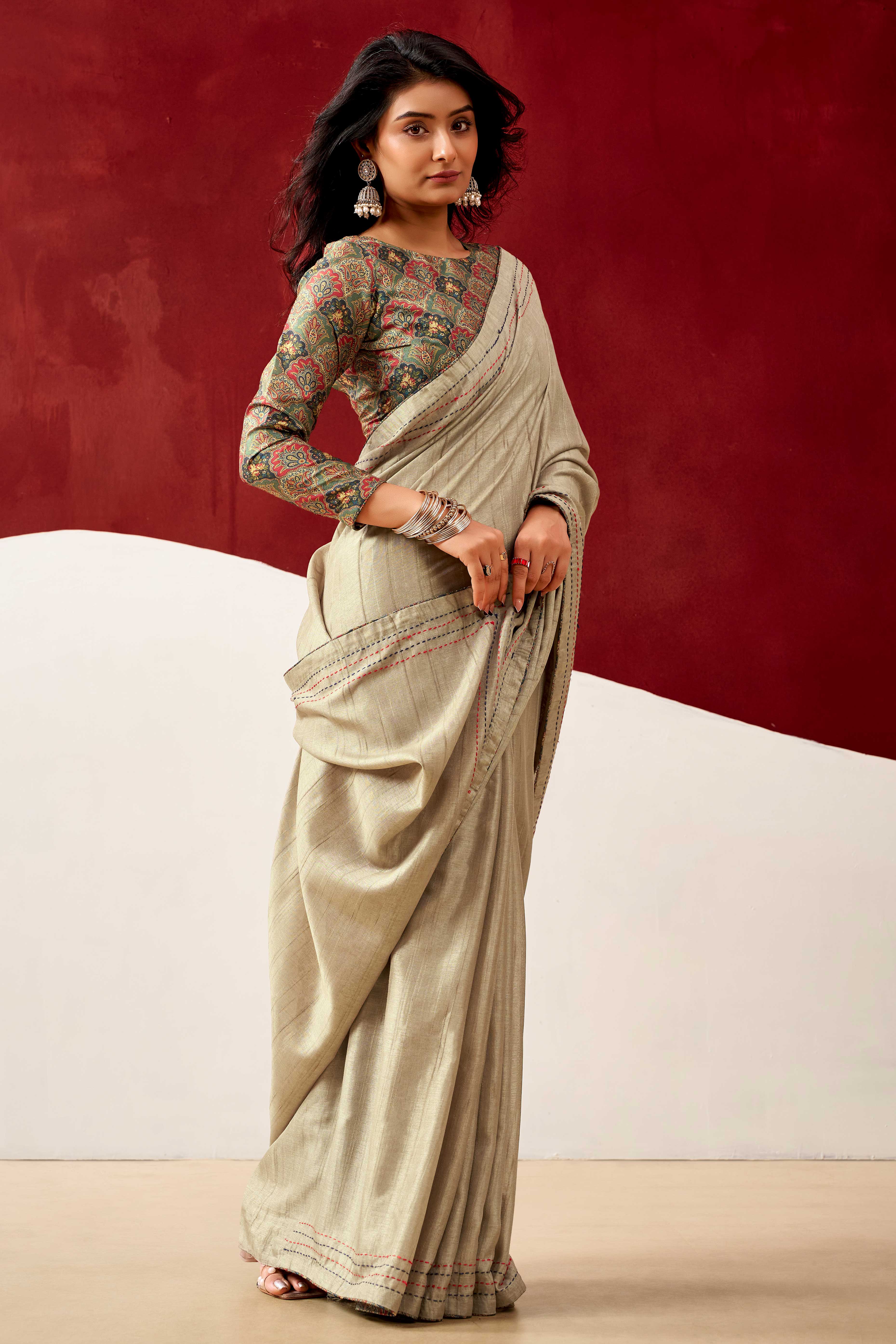 Graceful Cream Handloom Cotton Blend Saree Featuring Striped Lining Embroidery & Tassel Pallu