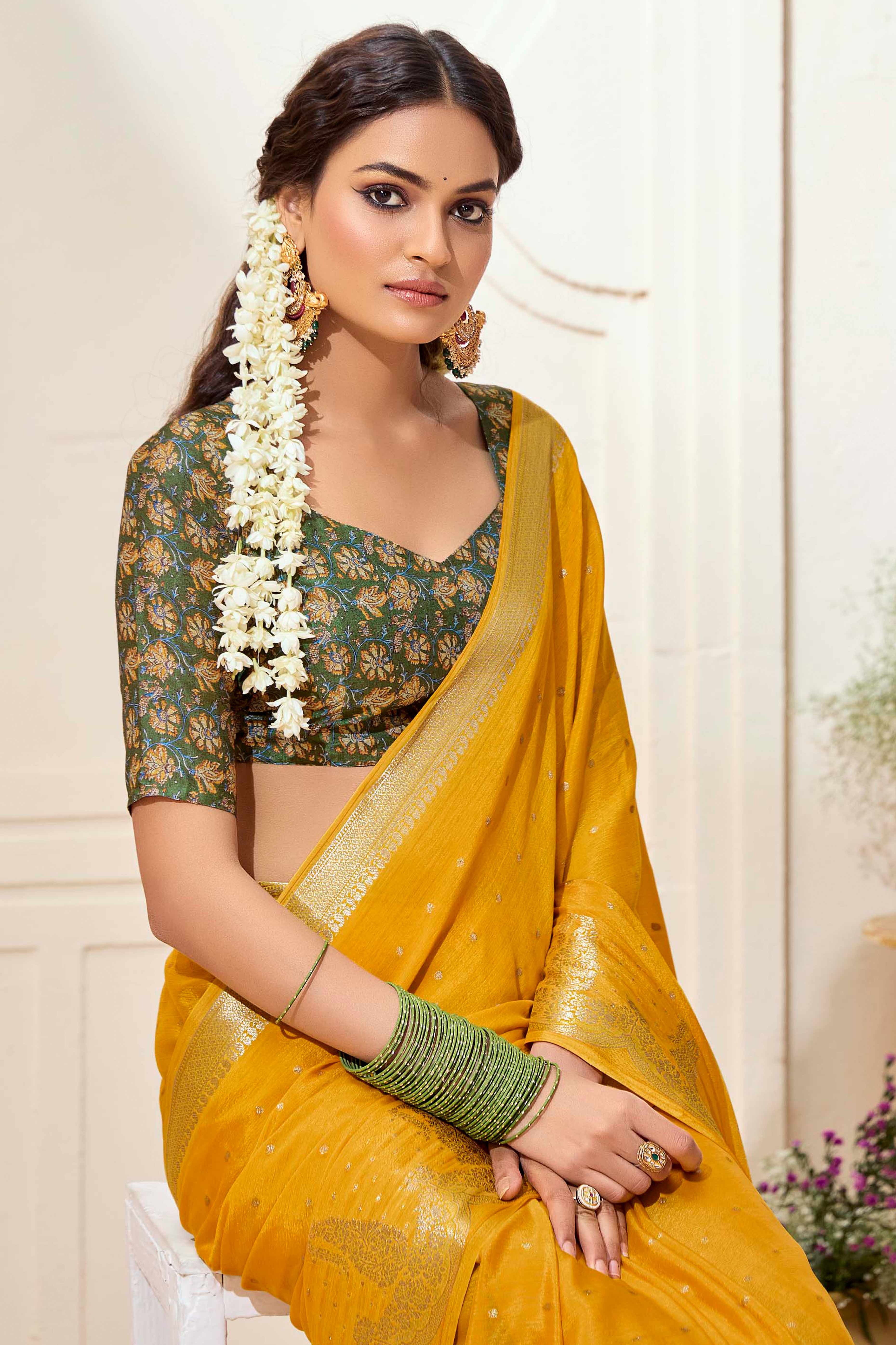 Mustard Chinon Saree with Jacquard Weaving and Delicate Tassel Accents