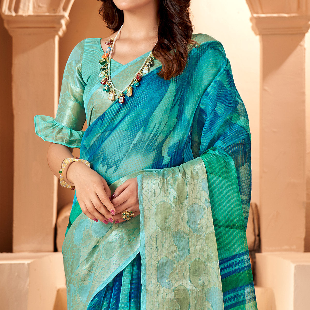 Blue & Sea Green Printed Organza Saree With Woven Border