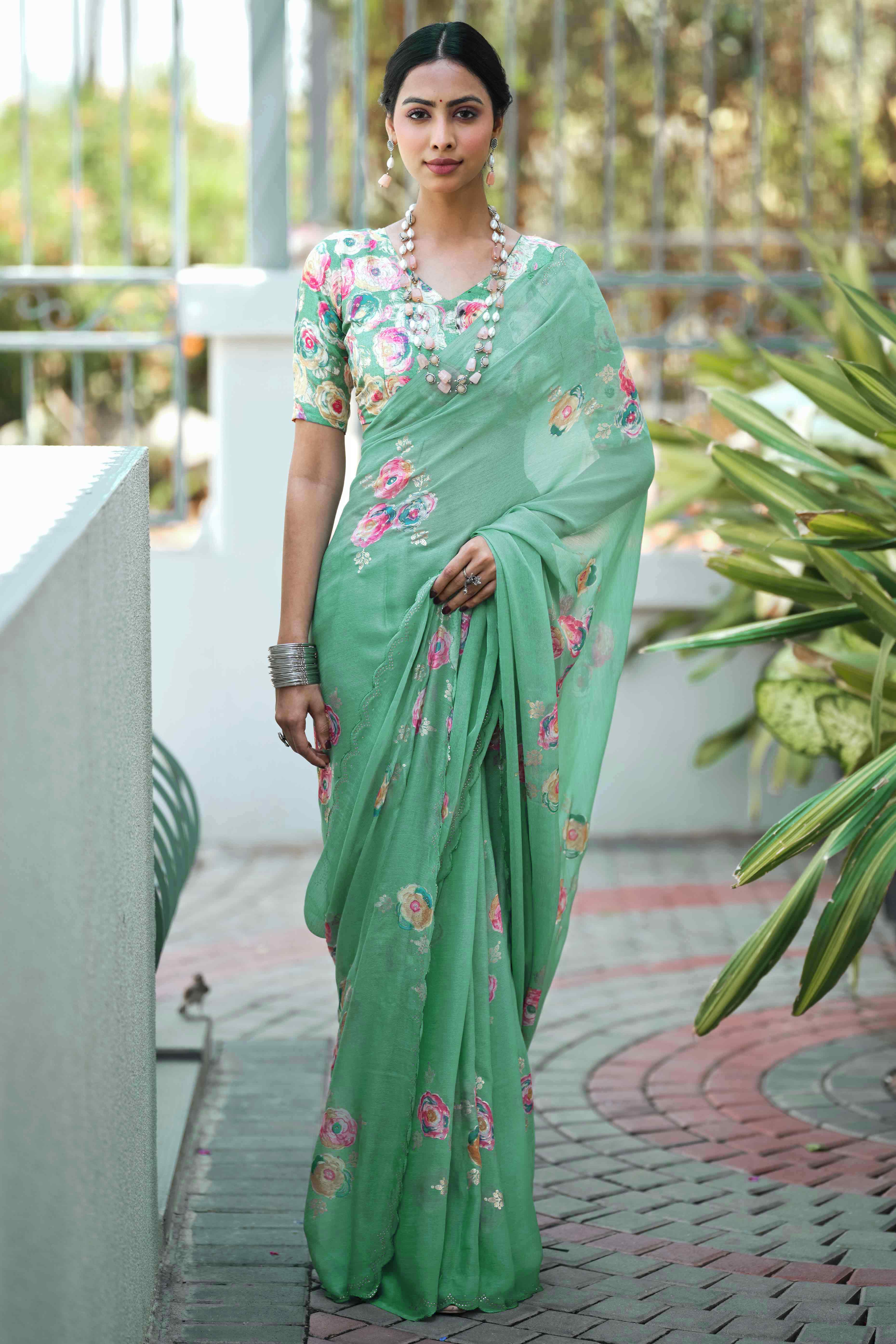 Elegant Sea Green Chiffon Saree with Floral and Foil Print Detailing