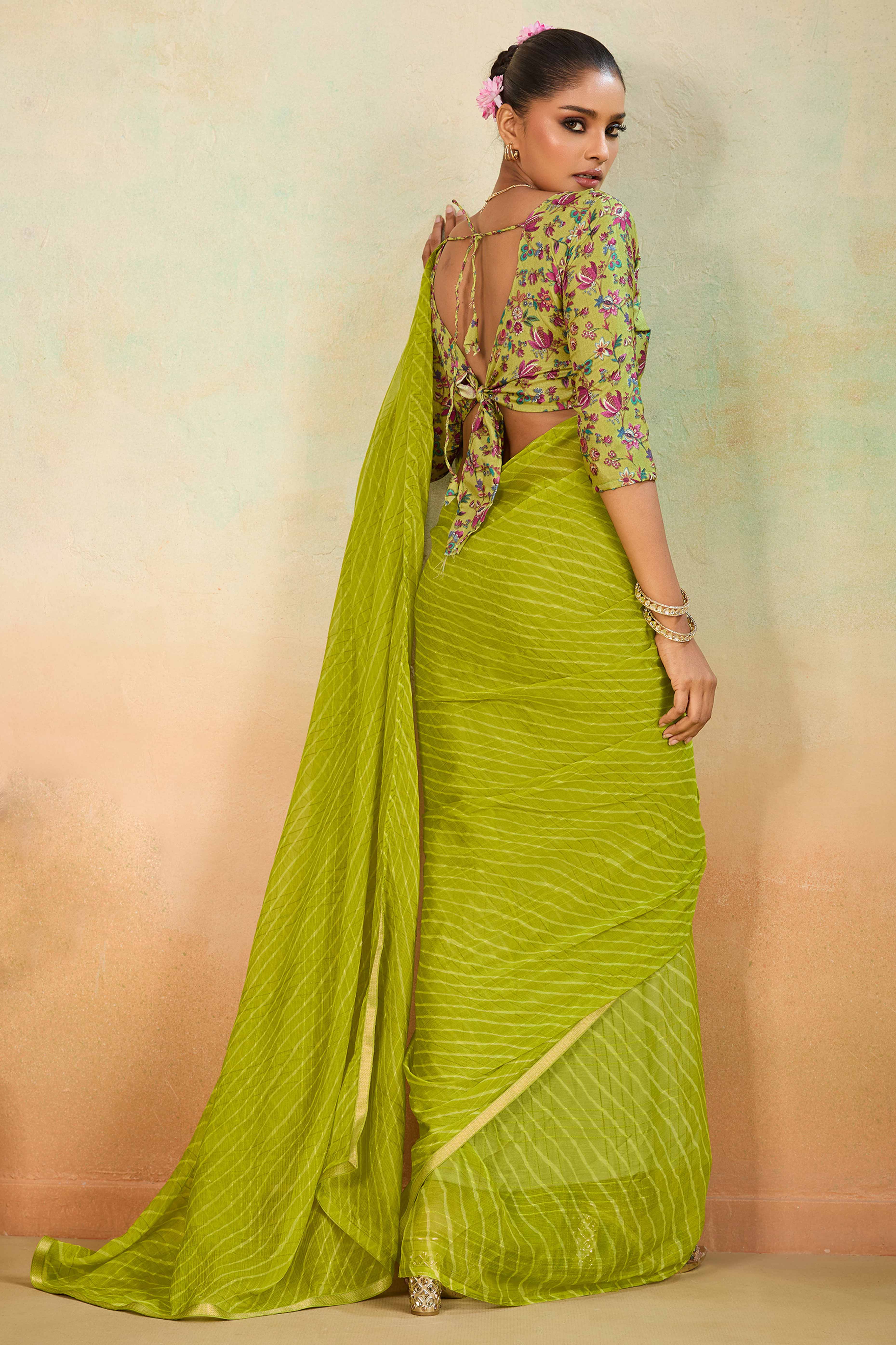 Green Leheriya Chiffon Saree Accented With Elegant Zari Lace Border Work