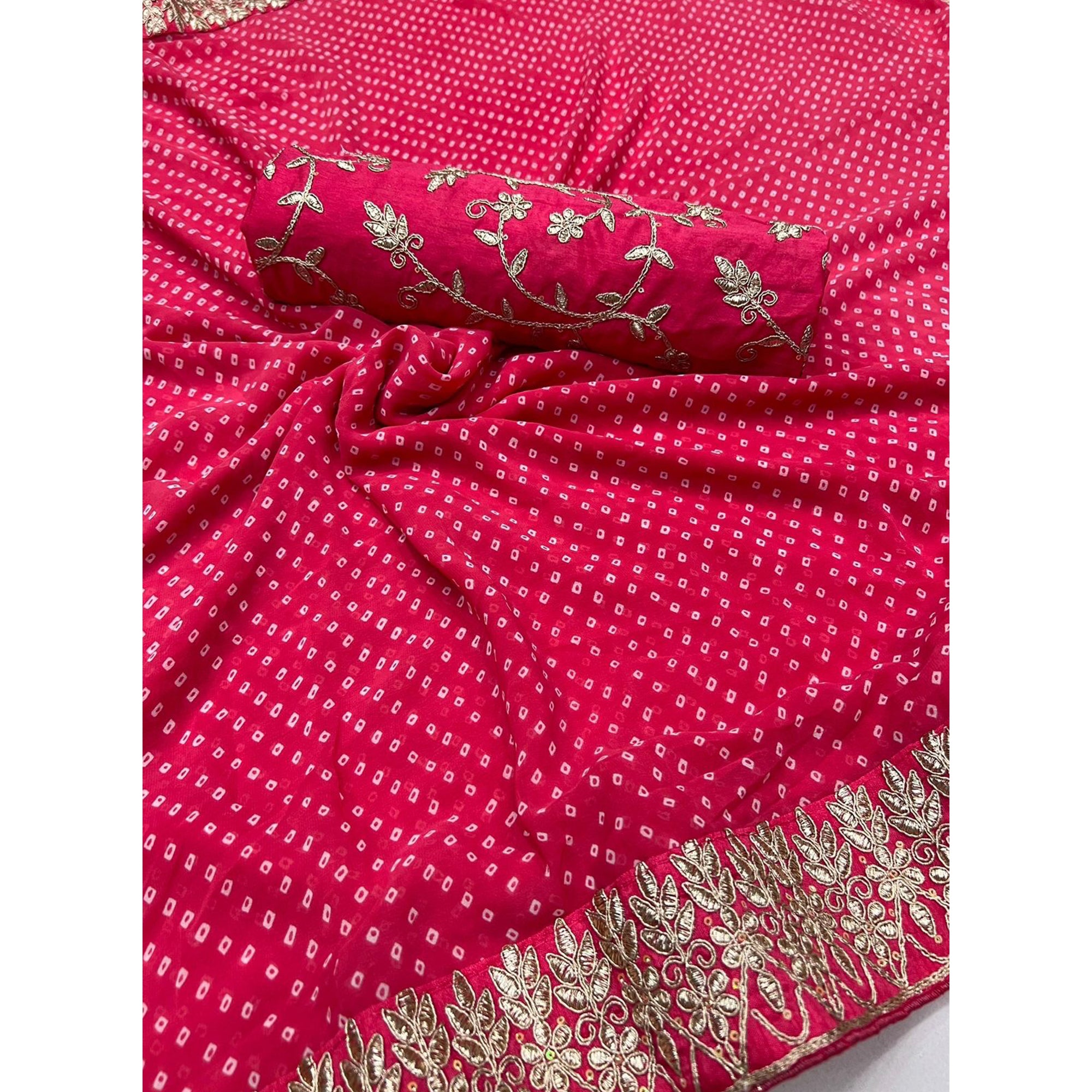 Pink Lightweight Georgette Saree Adorned with Classic Bandhani Prints and Lace Work