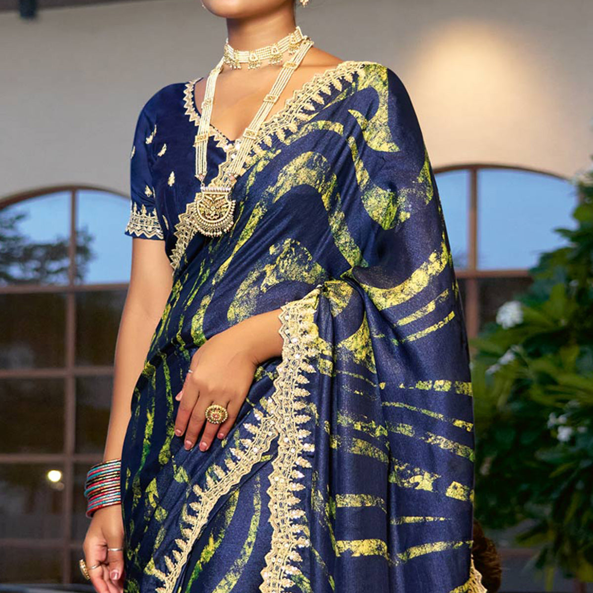 Blue Printed Chiffon Saree With Sequins Border