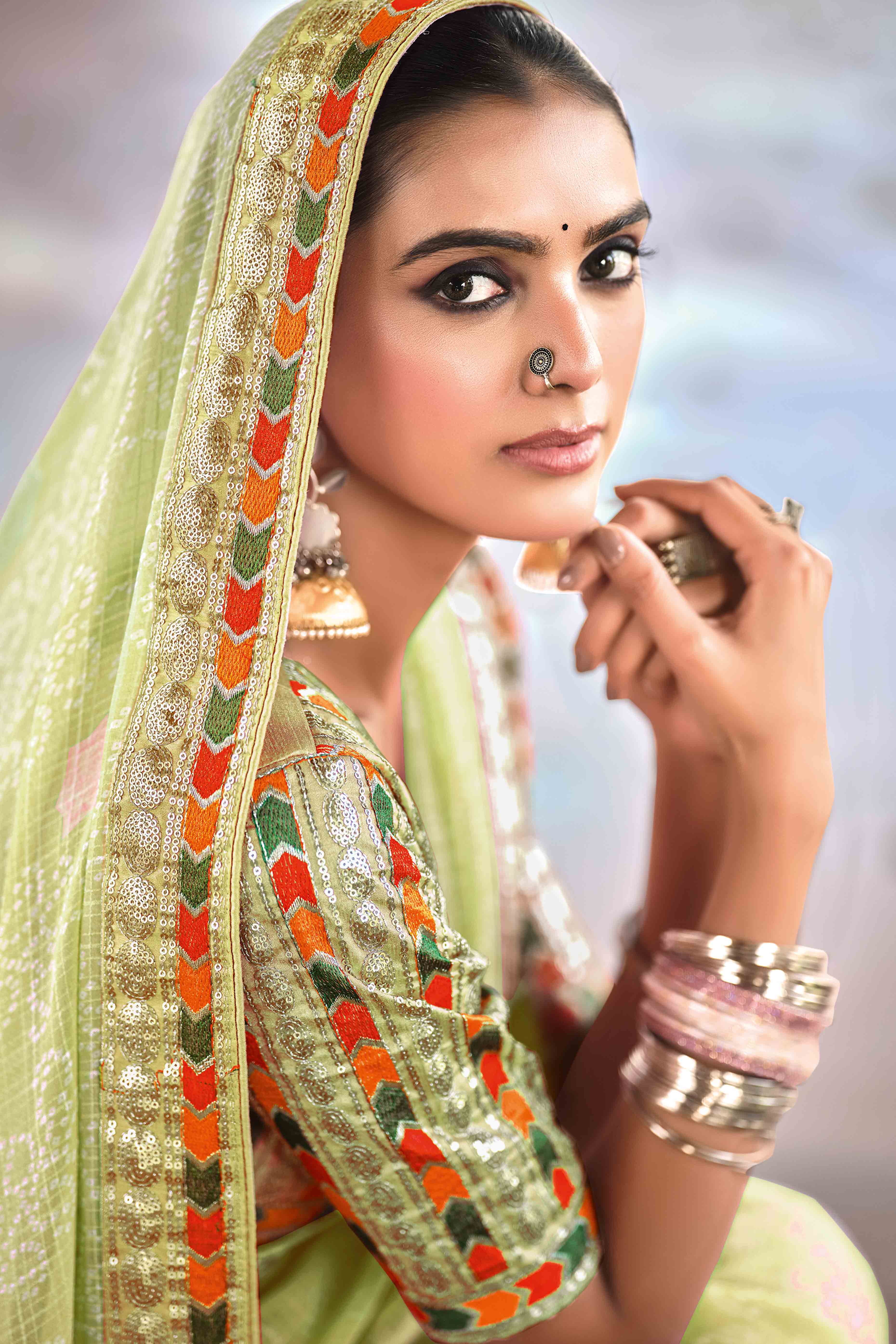 Green Bandhani Printed Georgette Saree With Glittering Sequin Embroidered Border