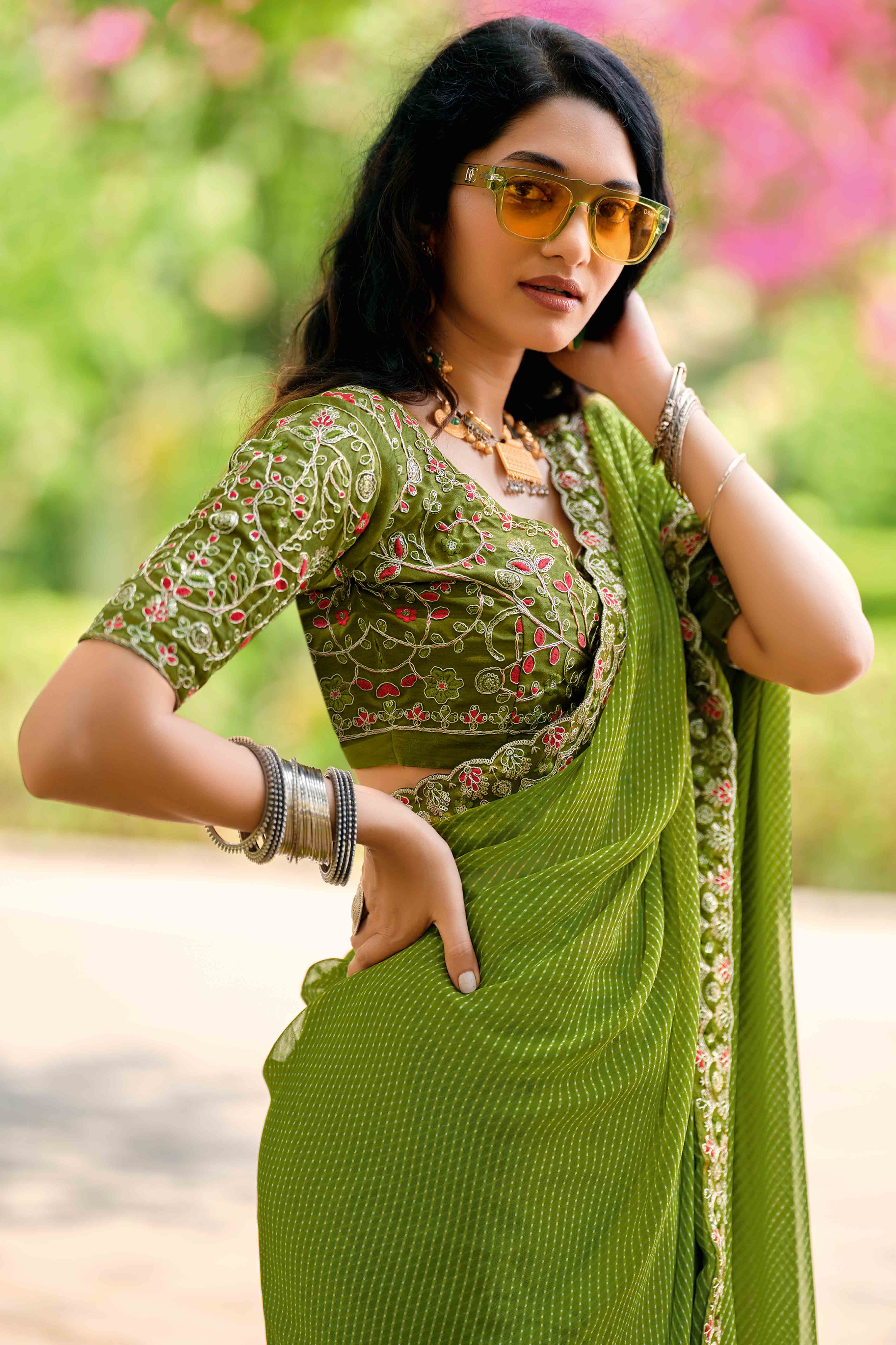 Green Striped Printed Georgette Saree With Shimmering Sequin Embroidered Border