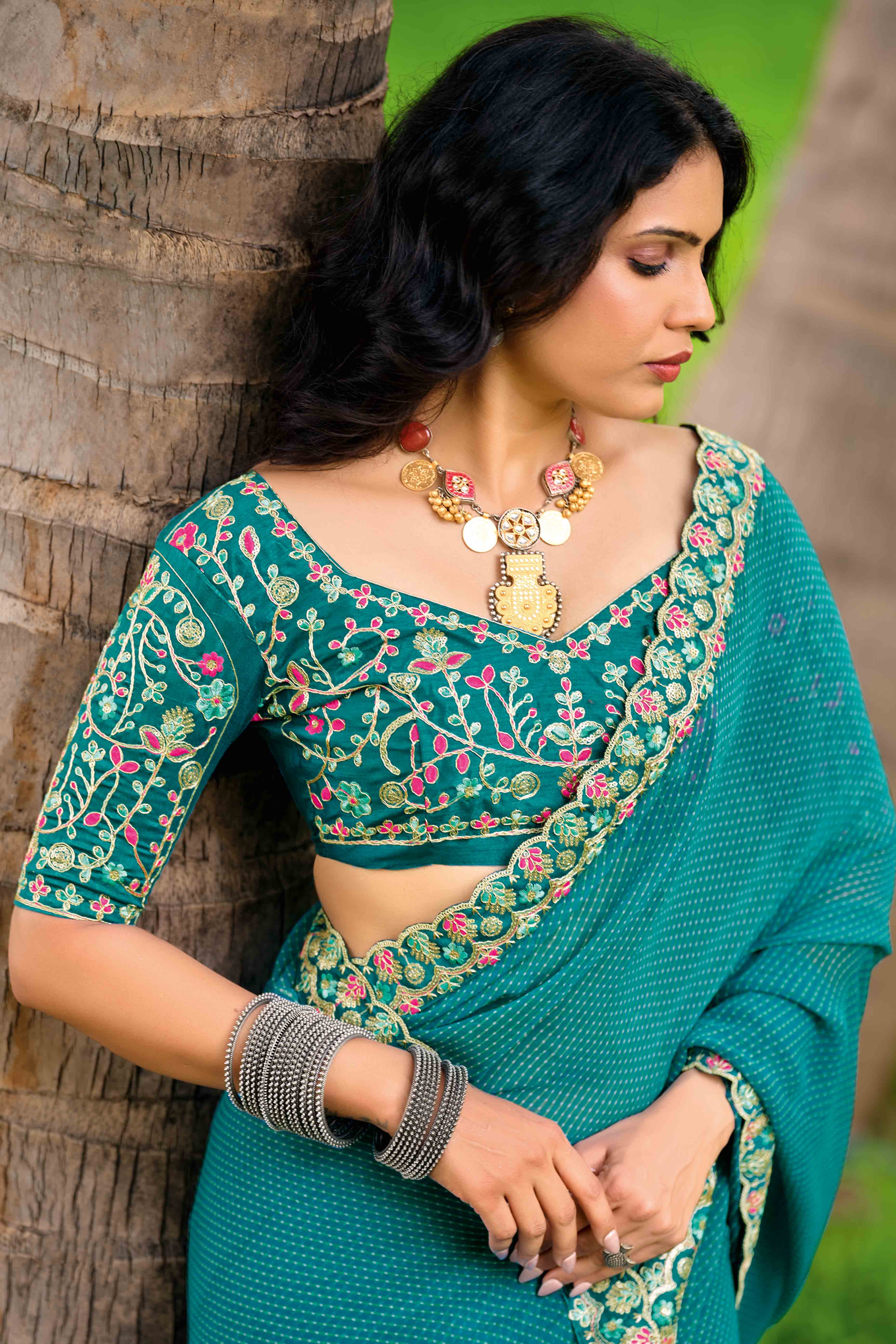 Rama Blue Striped Printed Georgette Saree With Shimmering Sequin Embroidered Border