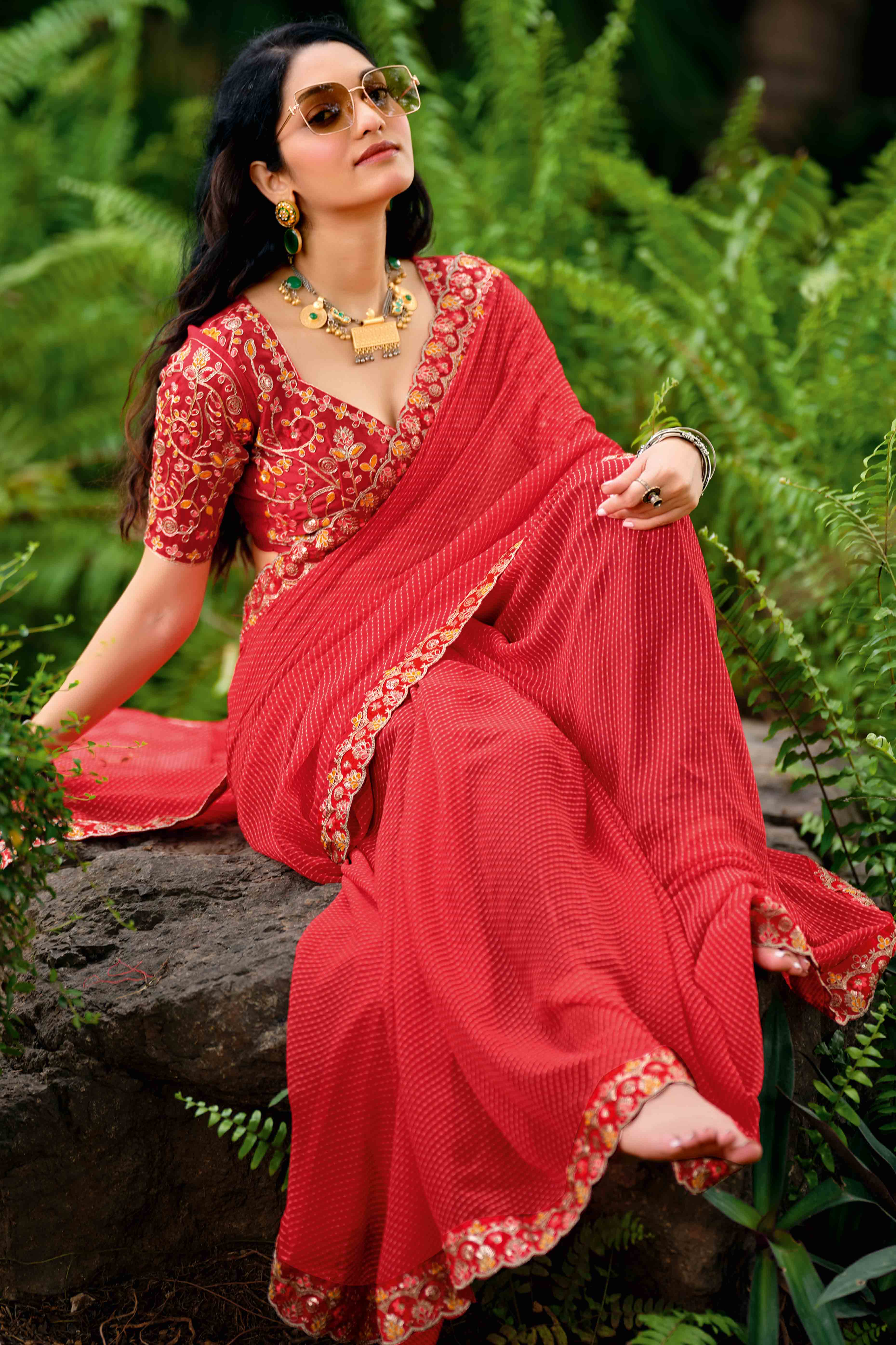 Coral Red Striped Printed Georgette Saree With Shimmering Sequin Embroidered Border