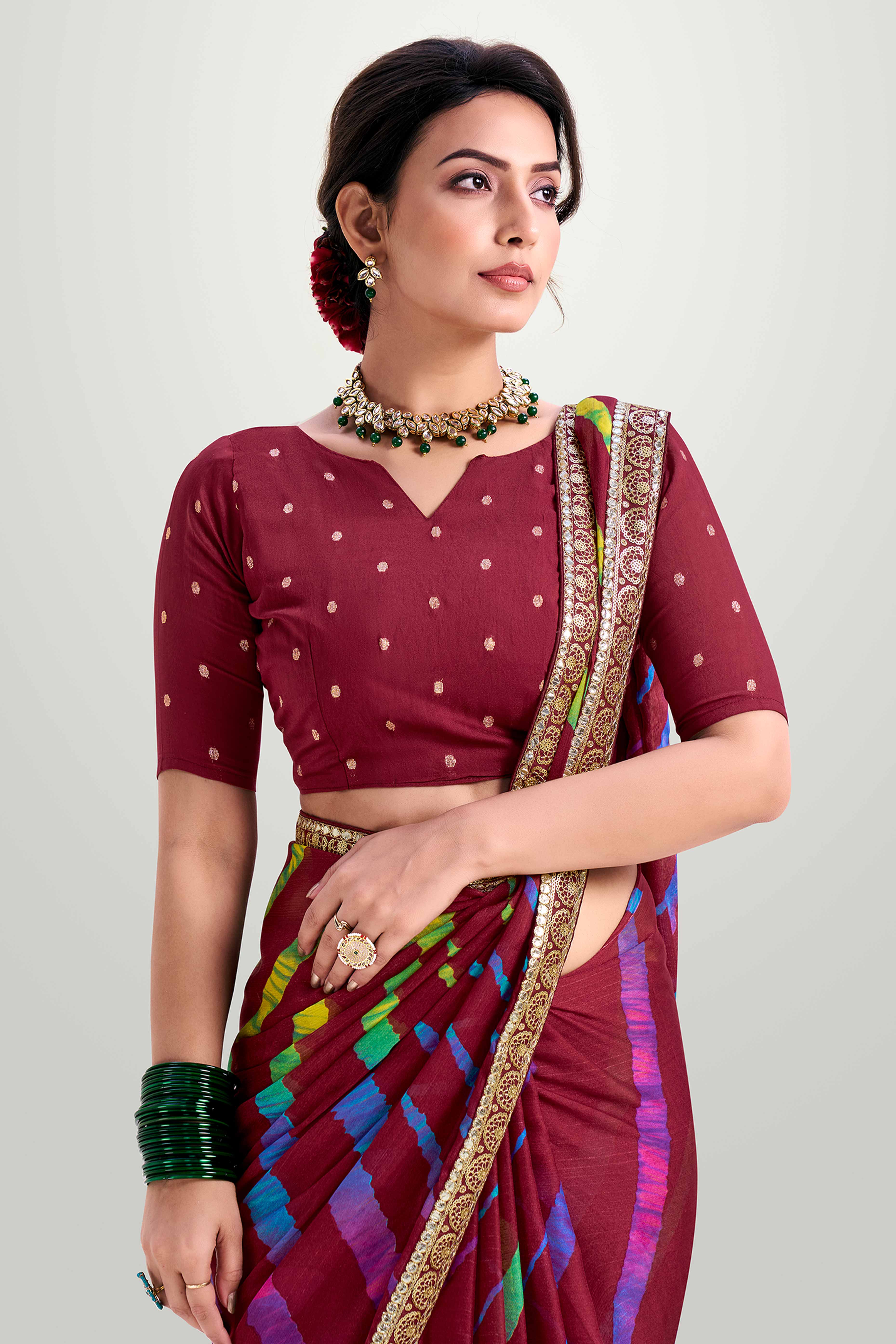 Maroon Striped Printed Chiffon Saree Enhanced With Sparkling Sequins Embroidered Border Work
