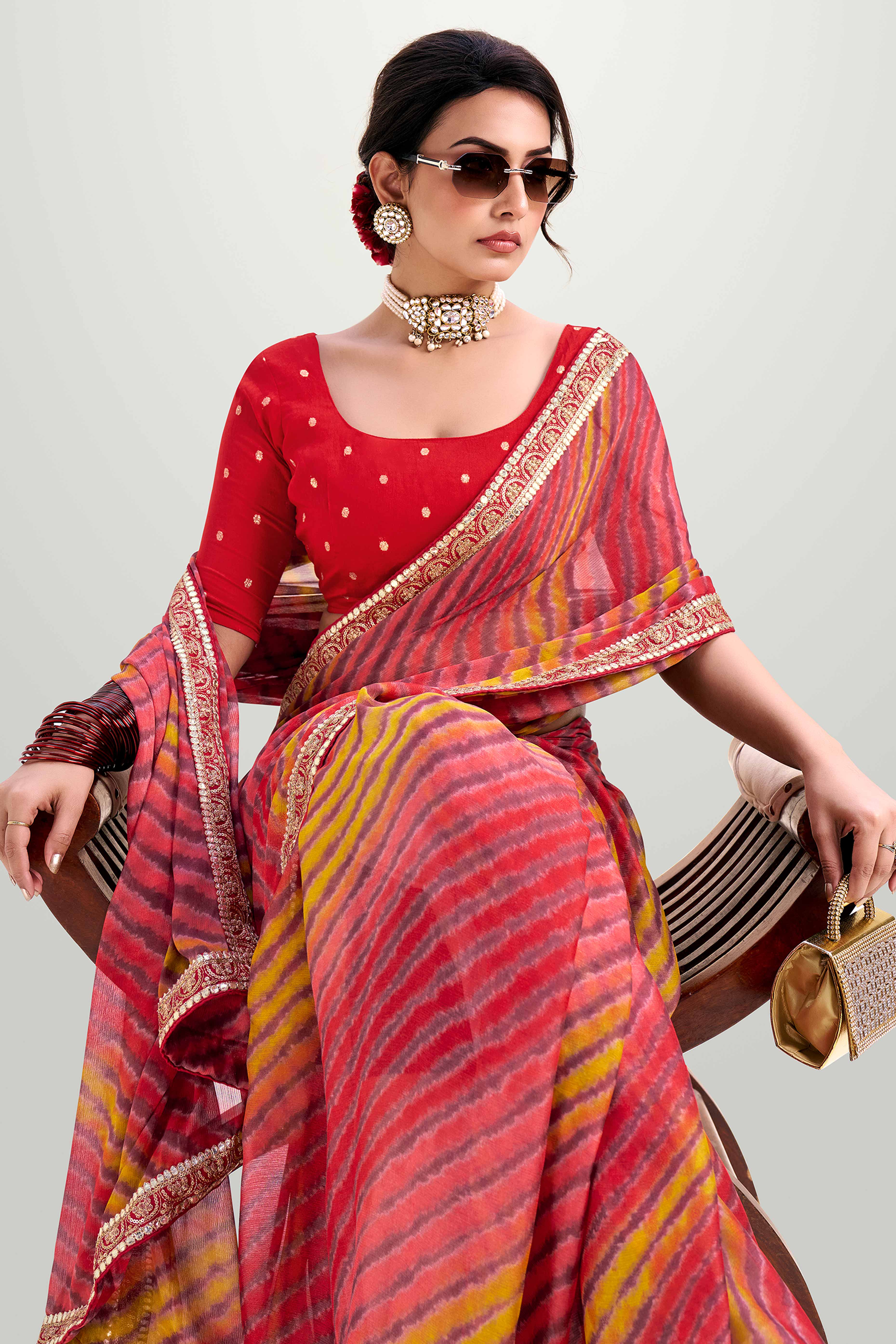 Bright Red Striped Printed Chiffon Saree Enhanced With Sparkling Sequins Embroidered Border Work