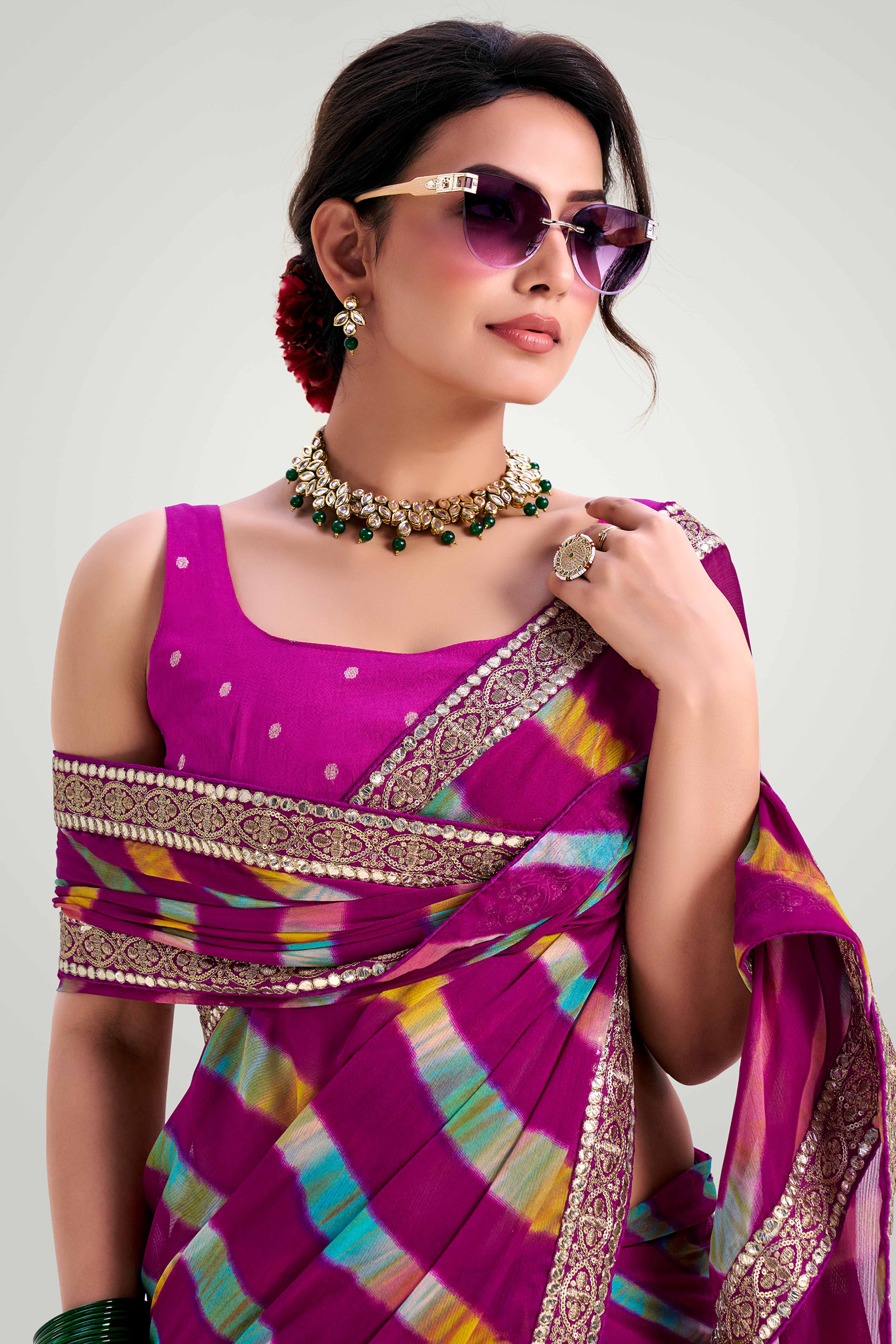 Purple Striped Printed Chiffon Saree Enhanced With Sparkling Sequins Embroidered Border Work