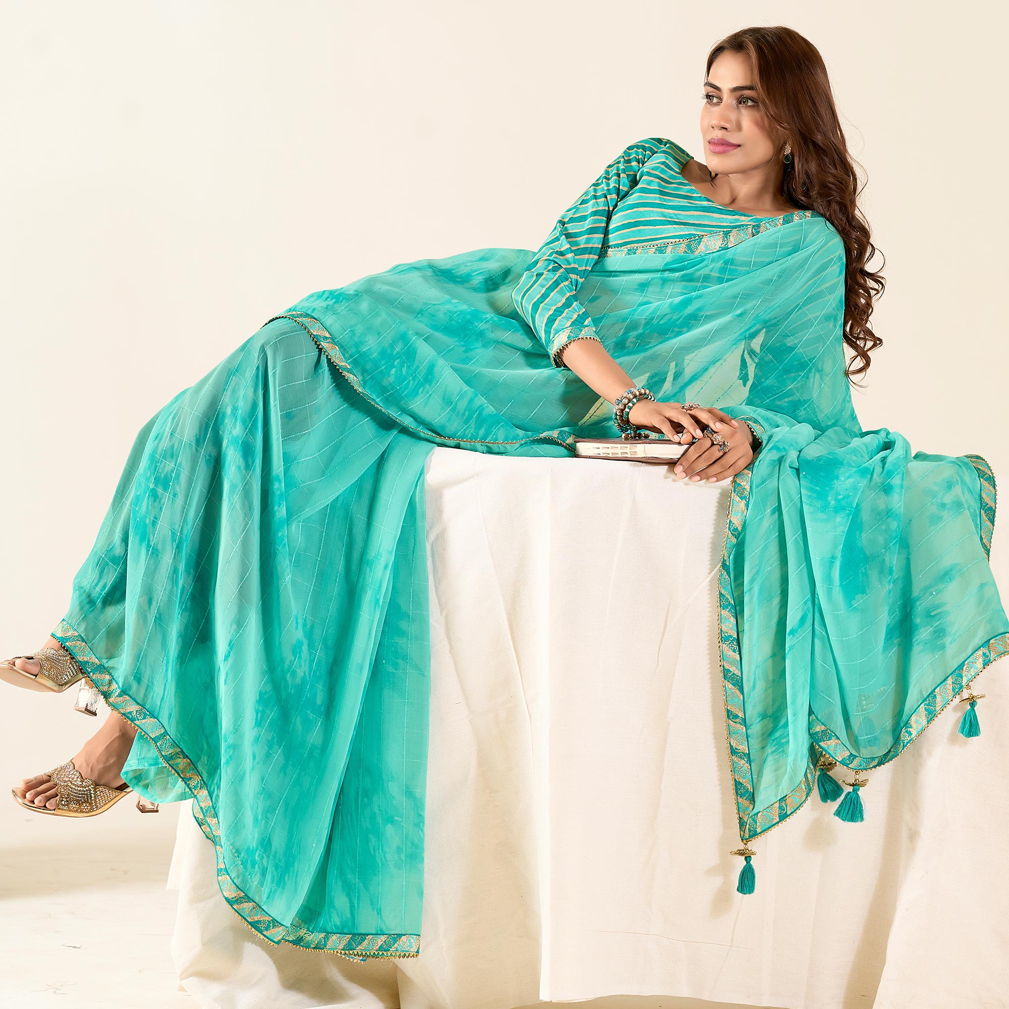 Turquoise Printed With Woven Georgette Saree With Tassels
