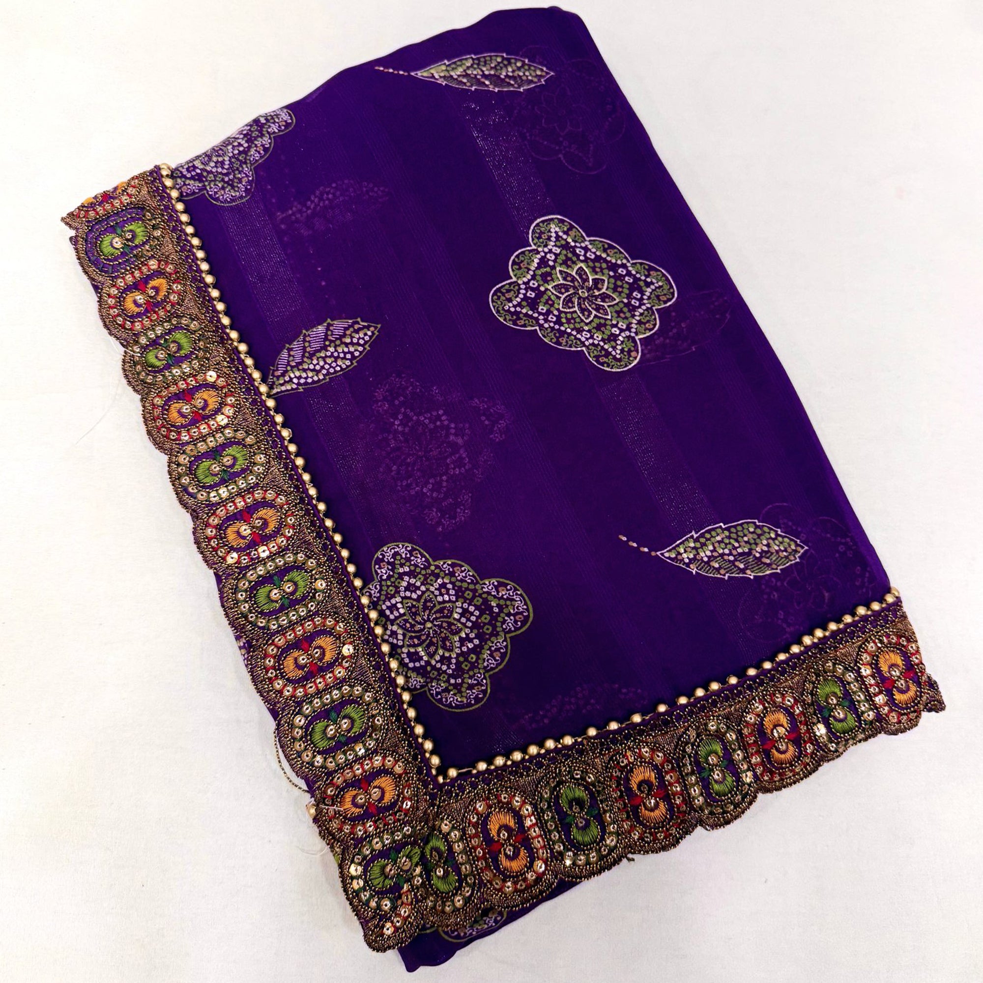 Violet Bandhani Printed Georgette Saree for Festive Wear with Lace Detailing
