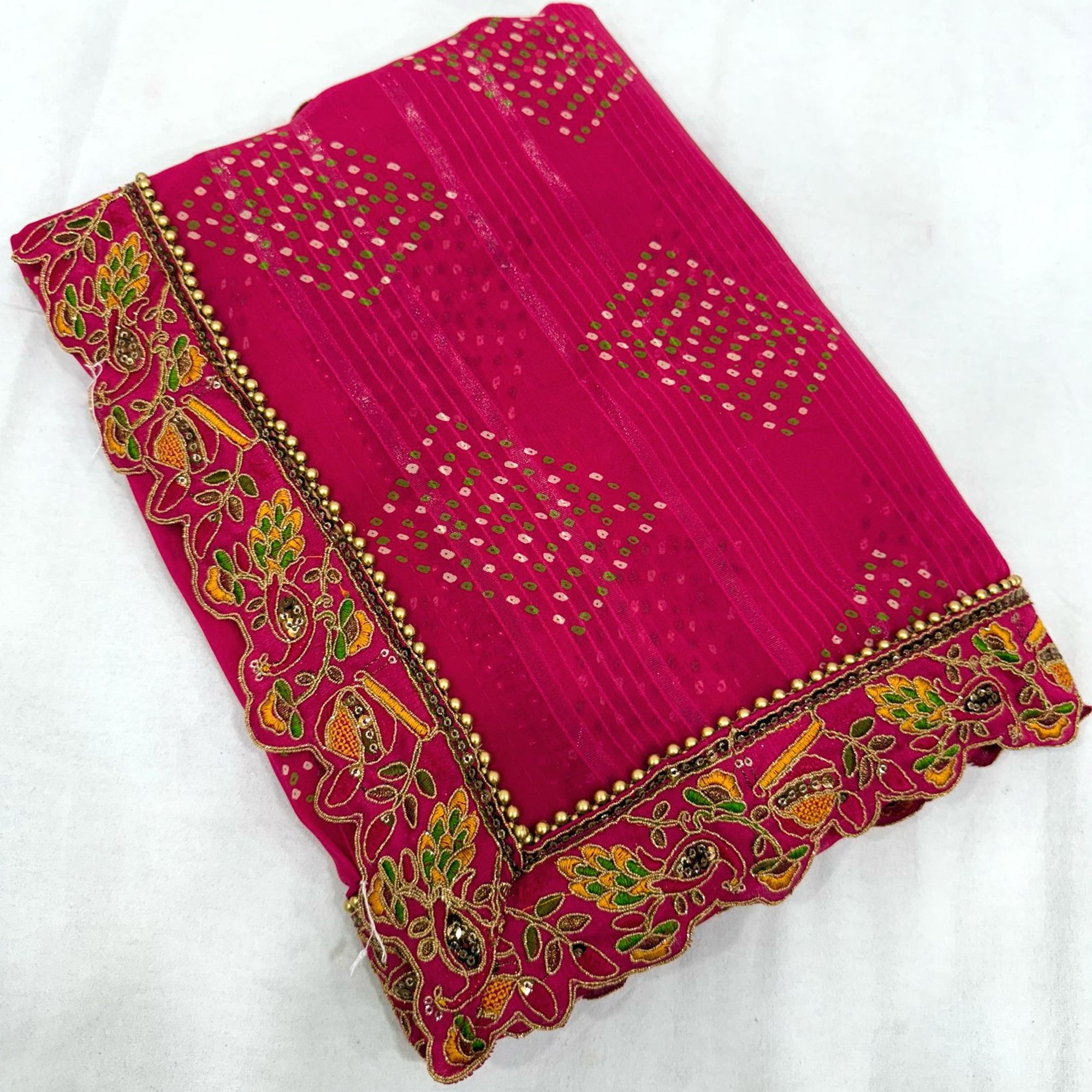 Pink Bandhani Printed Georgette Saree for Festive Wear with Lace Border