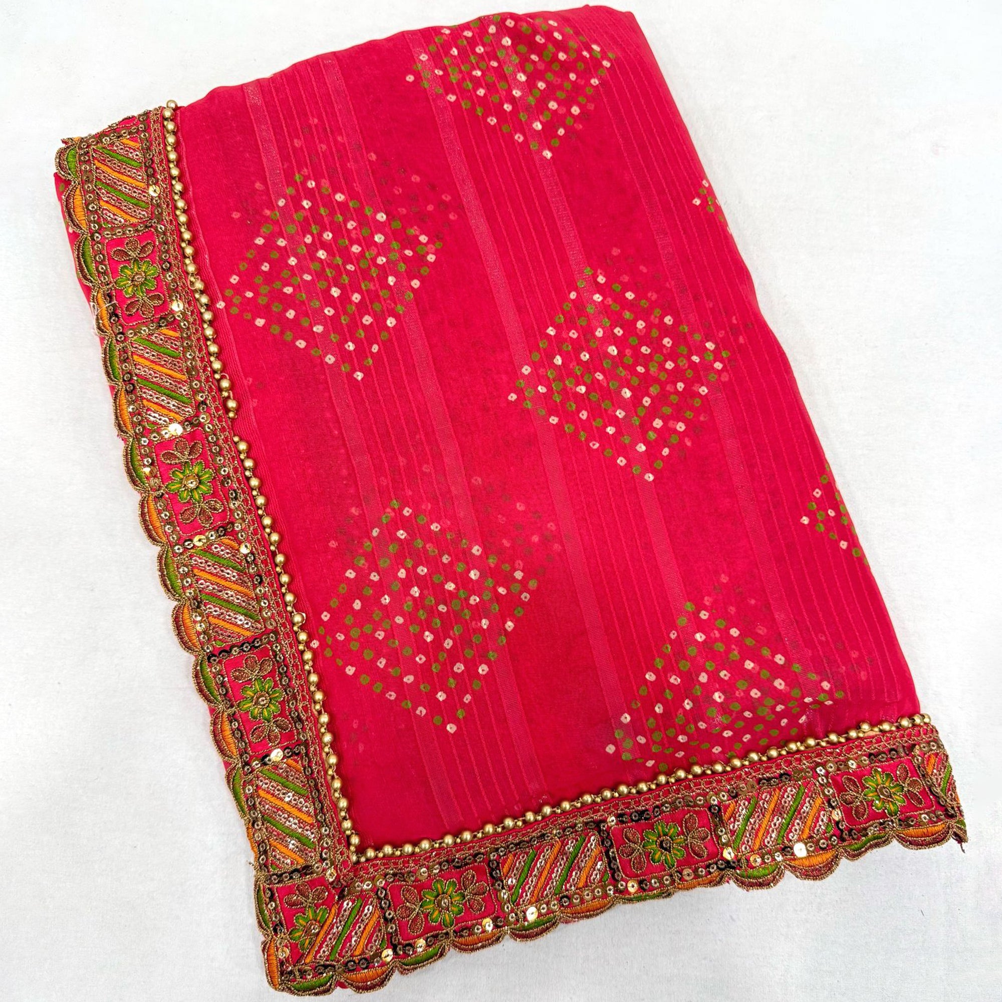 Pink Bandhani Printed Georgette Saree for Festive Wear with Lace Detailing