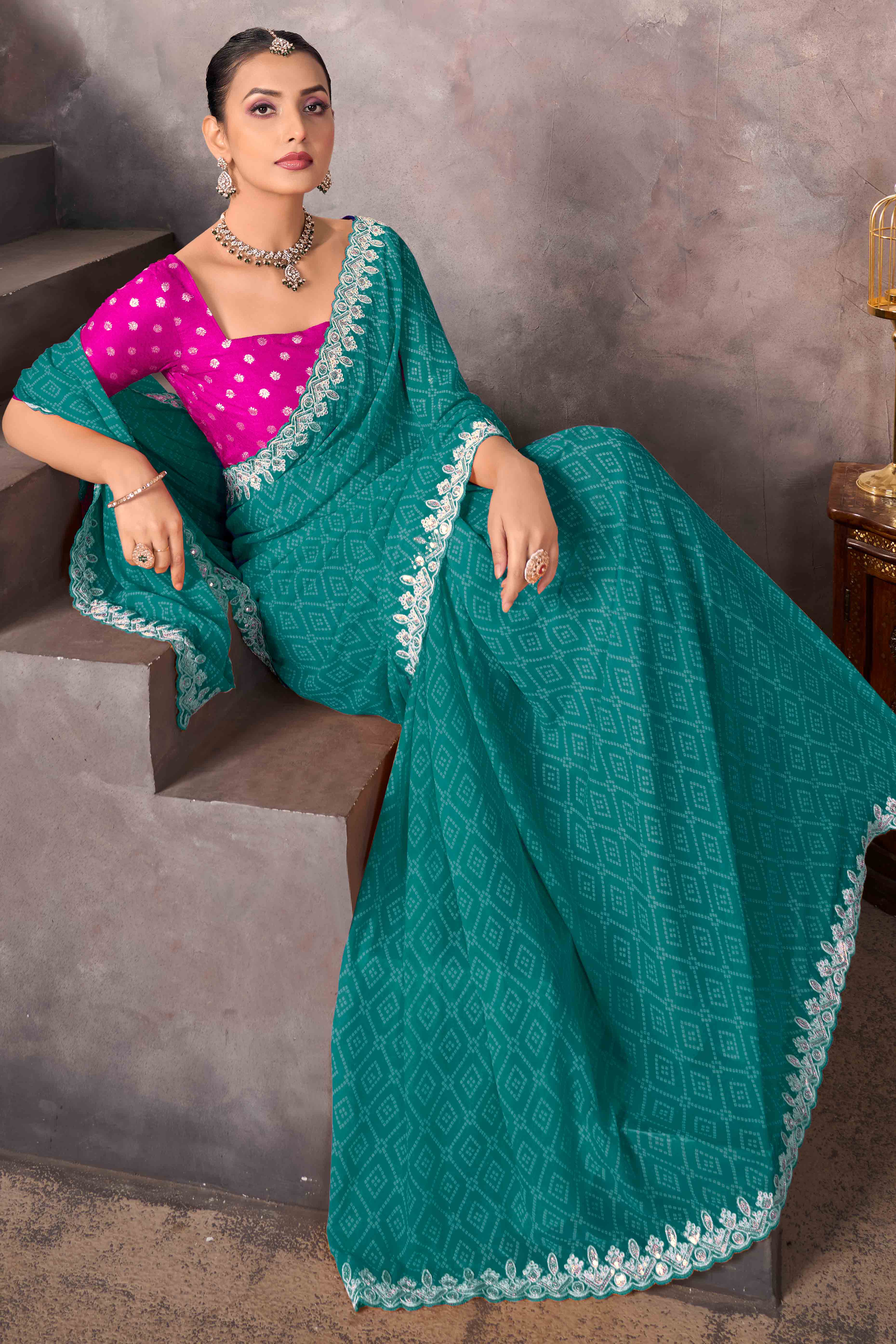 Modern Turquoise Georgette Saree with Timeless Bandhani Prints