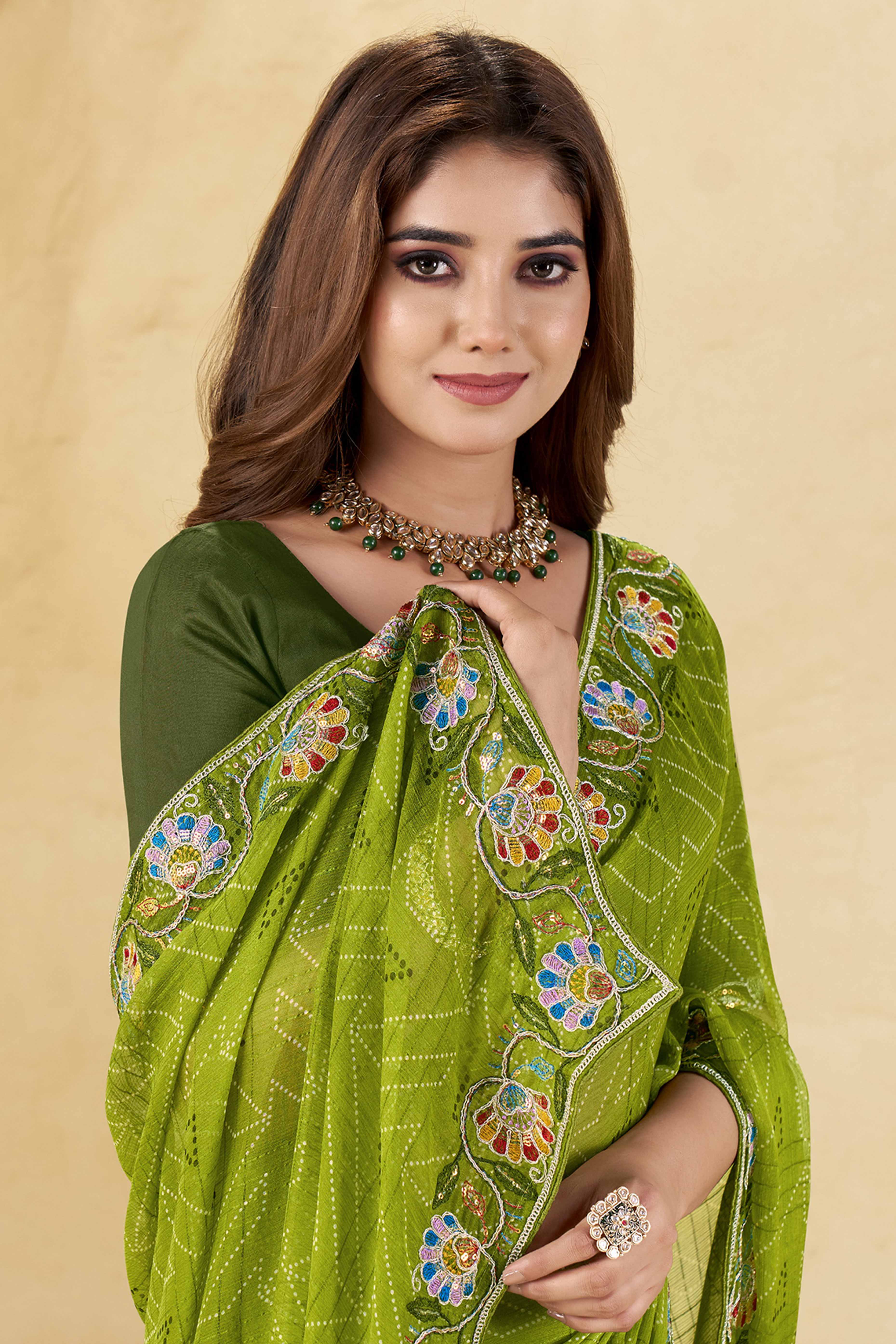 Green Geometric Printed Chiffon Saree Accented With Floral Sequins Embroidered Border Work