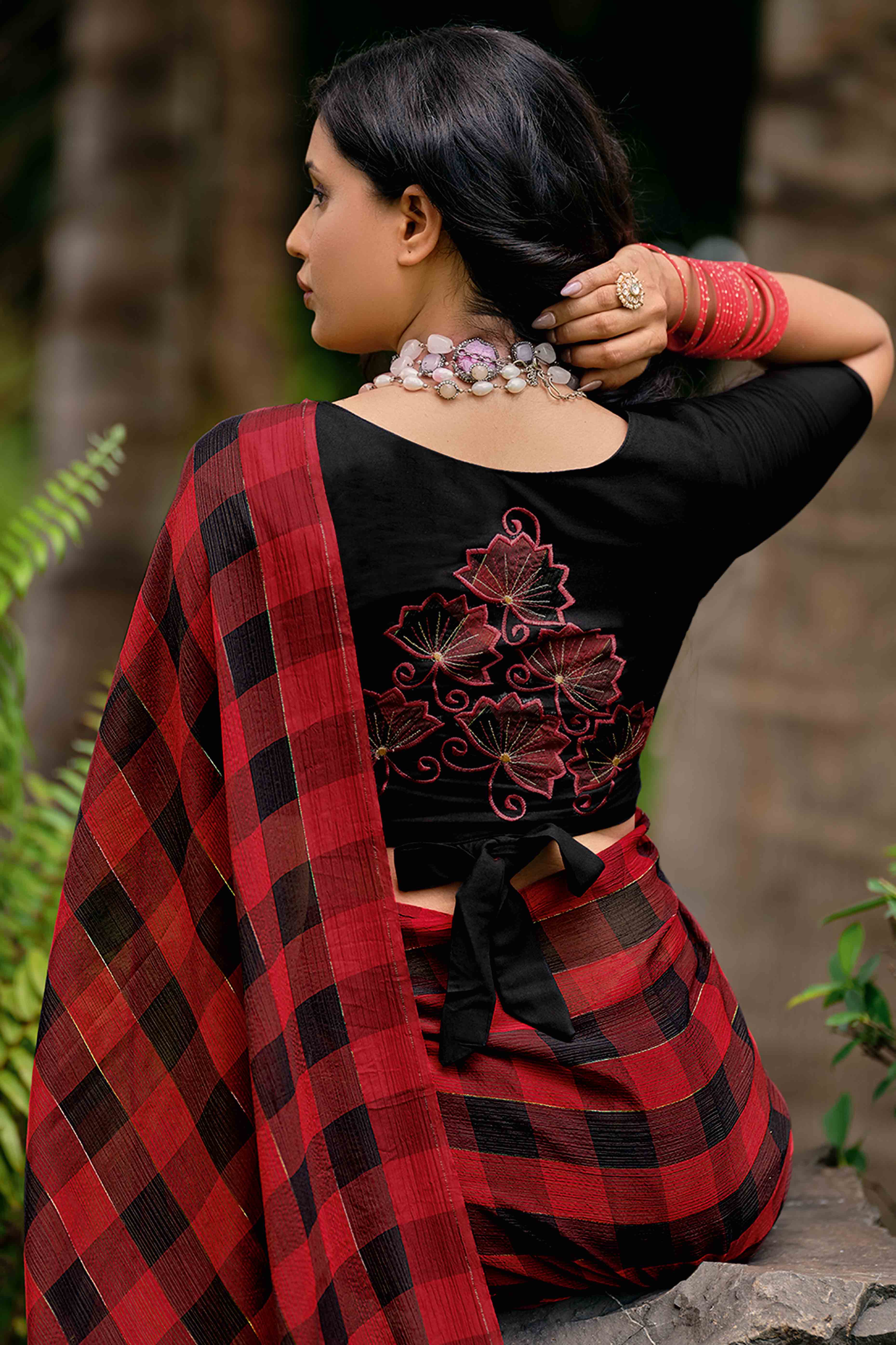 Red With Intricate Black Weaving Checks Georgette Saree