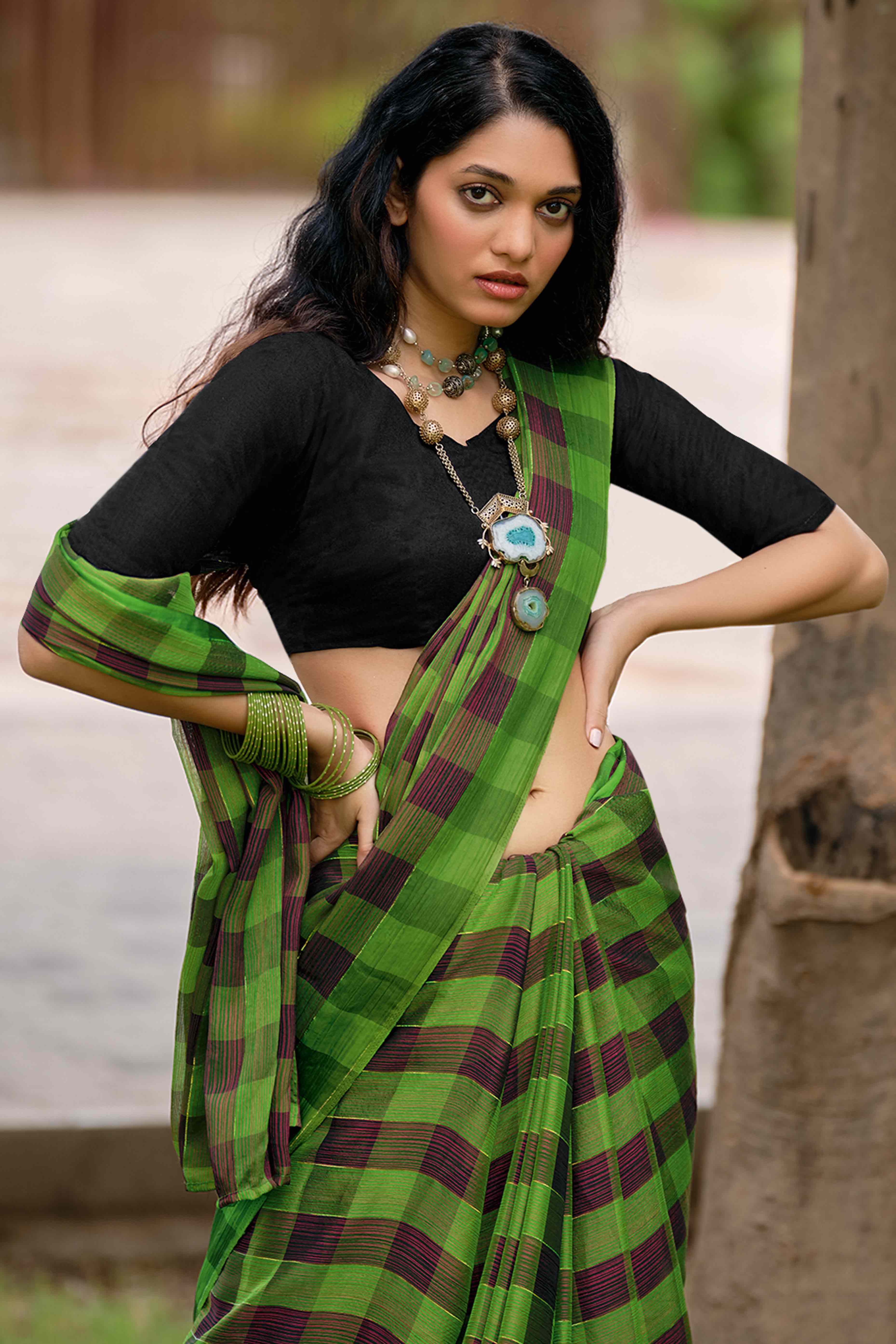 Green With Intricate Black Weaving Checks Georgette Saree