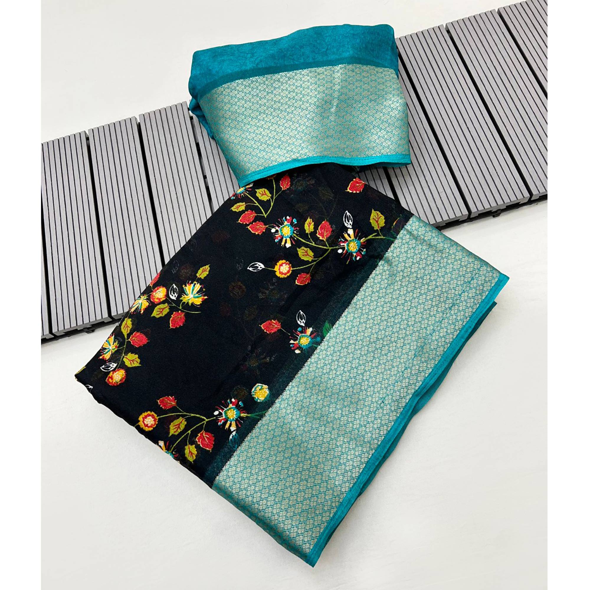 Black & Blue Floral Printed Moss Georgette Saree With Woven Border