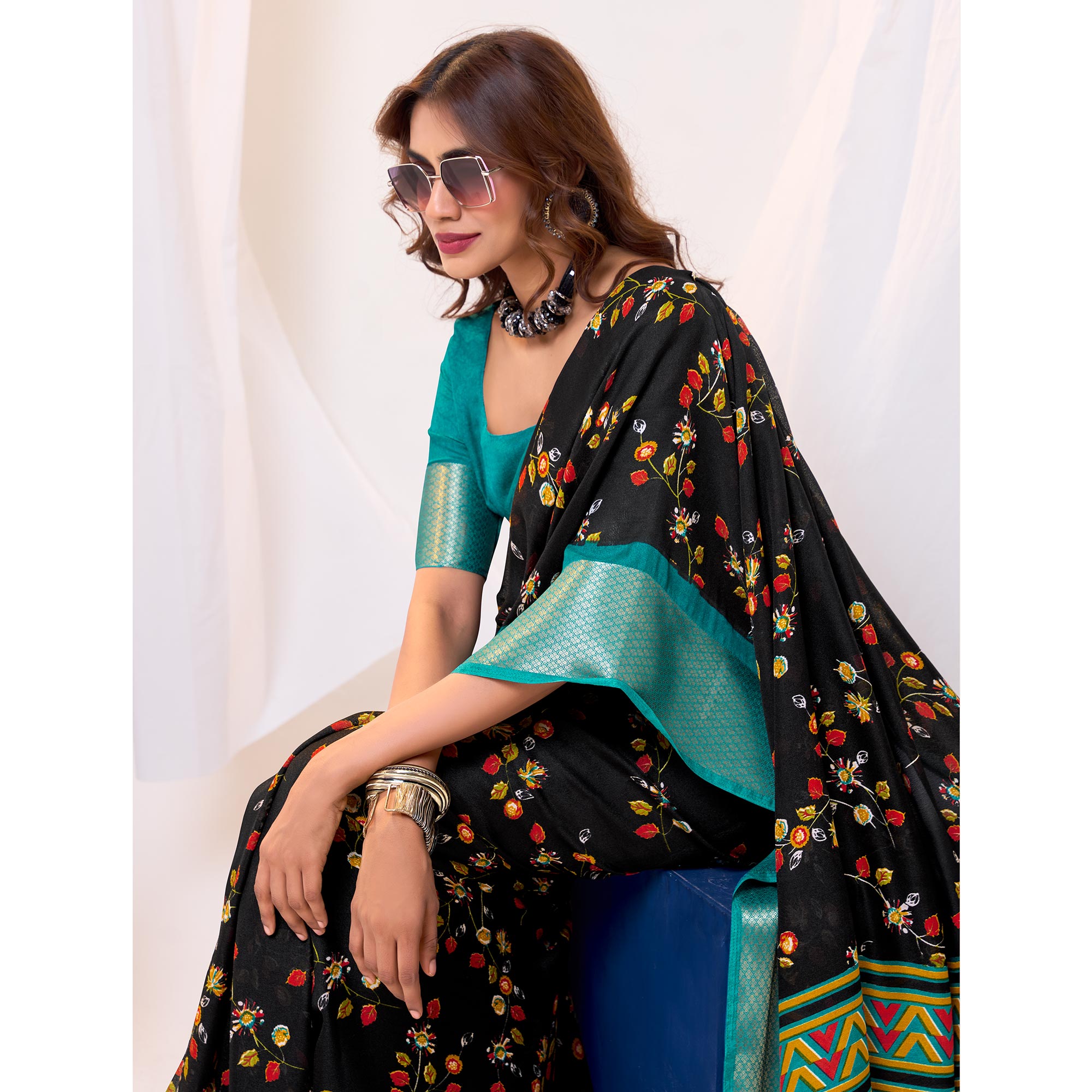 Black & Rama Blue Floral Printed Cotton Blend Saree With Woven Border