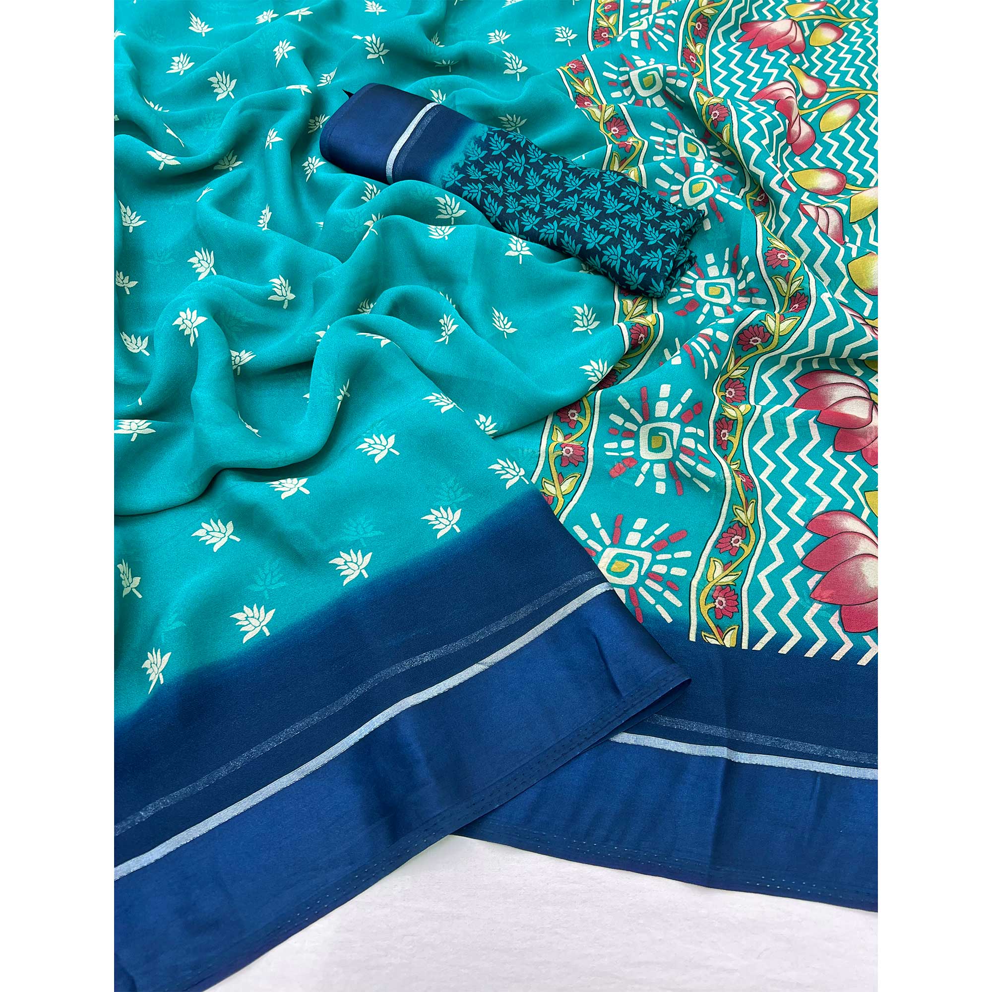 Blue Floral Printed Georgette Saree With Zari Border
