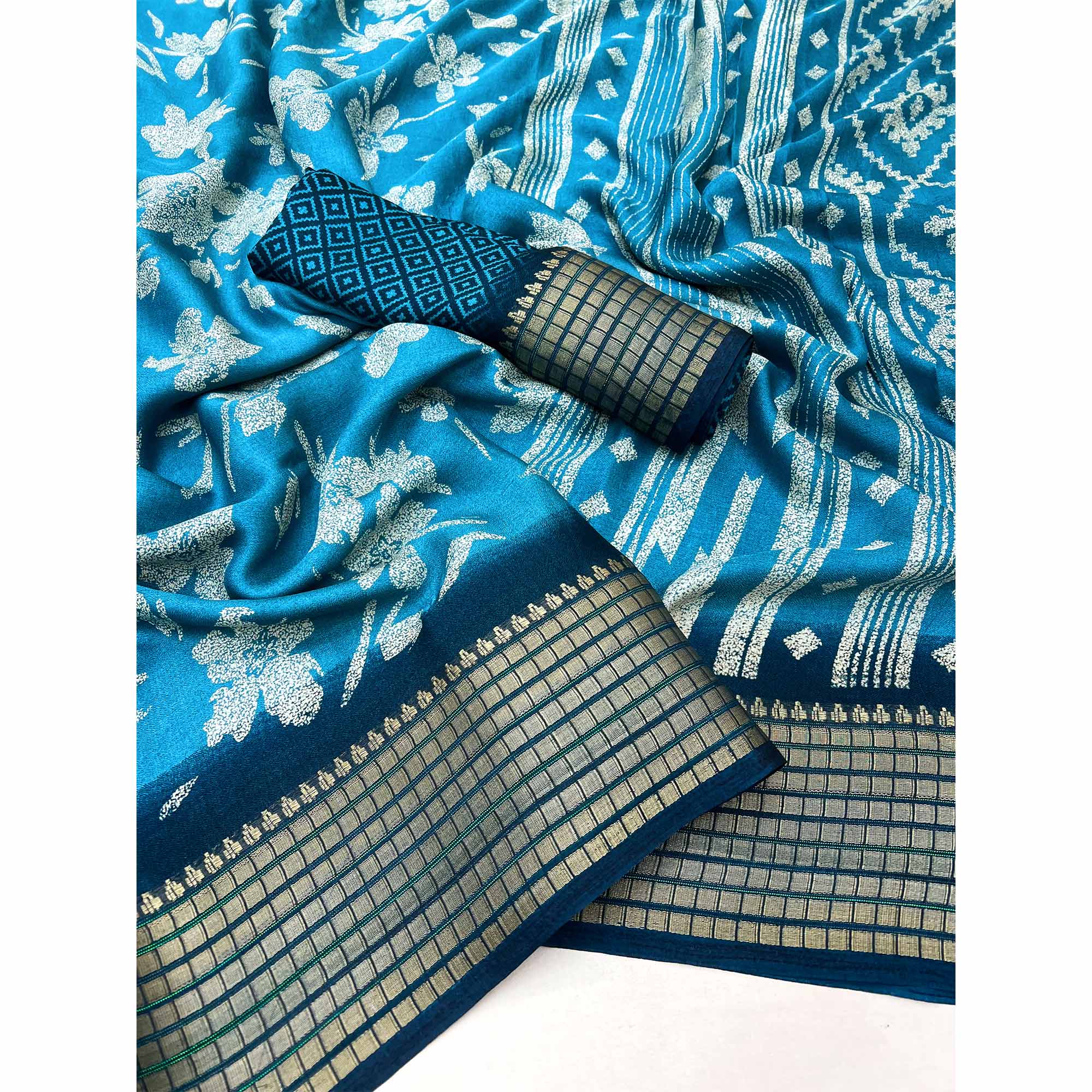 Blue Floral Printed Georgette Saree With Woven Border